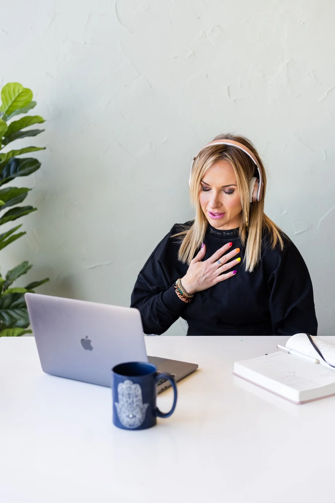 Drea Hemmer, speaks to a client on a video conference call.