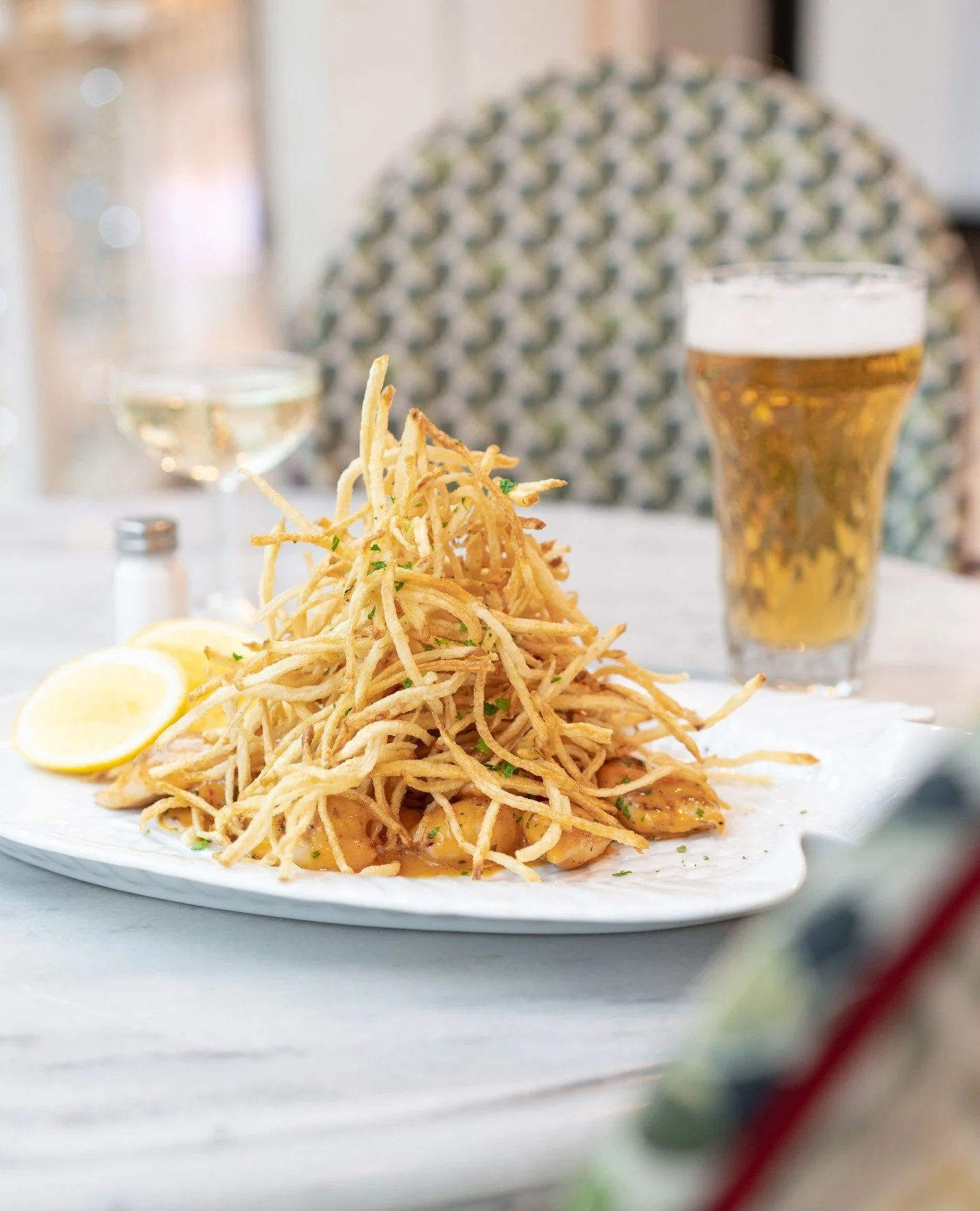 Number One reason to be cheerful: Calamari Proven&ccedil;al in spicy lemon butter sauce with matchstick fries. Number Two: something long and cool to wash it down with.⁠
⁠
#calamariprovencal #calamari #reasonstobecheerful #leparc #leparcbytashas #byt