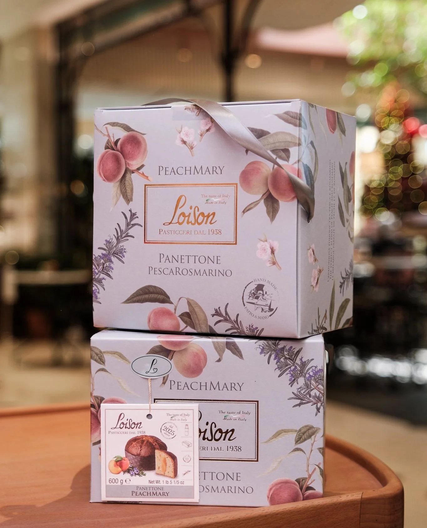 A Christmas tale of two panettones: PeachMary with peach and rosemary, and the emerald green pistachio and matcha. Beautifully packed and wrapped and ready to place under the tree.⁠
⁠
#pannetone #loisonpanetonne #christmas #retailemporium #leparc #le