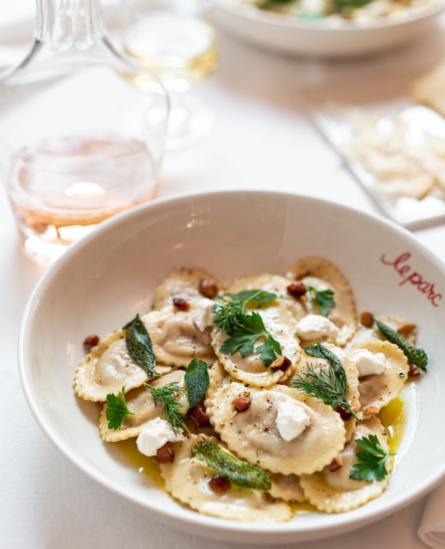 Pockets of pasta happiness. Butternut pansotti with burnt butter, crisped sage, toasted almonds and creamed feta.⁠
⁠
#butternutpansotti #leparc #leparcbytashas #tashasgroup ⁠