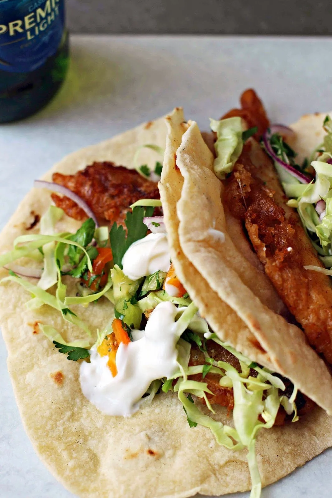 Beer Battered Fish Tacos with Tomato and Kiwi Salsa and Yoghurt Lime Crema