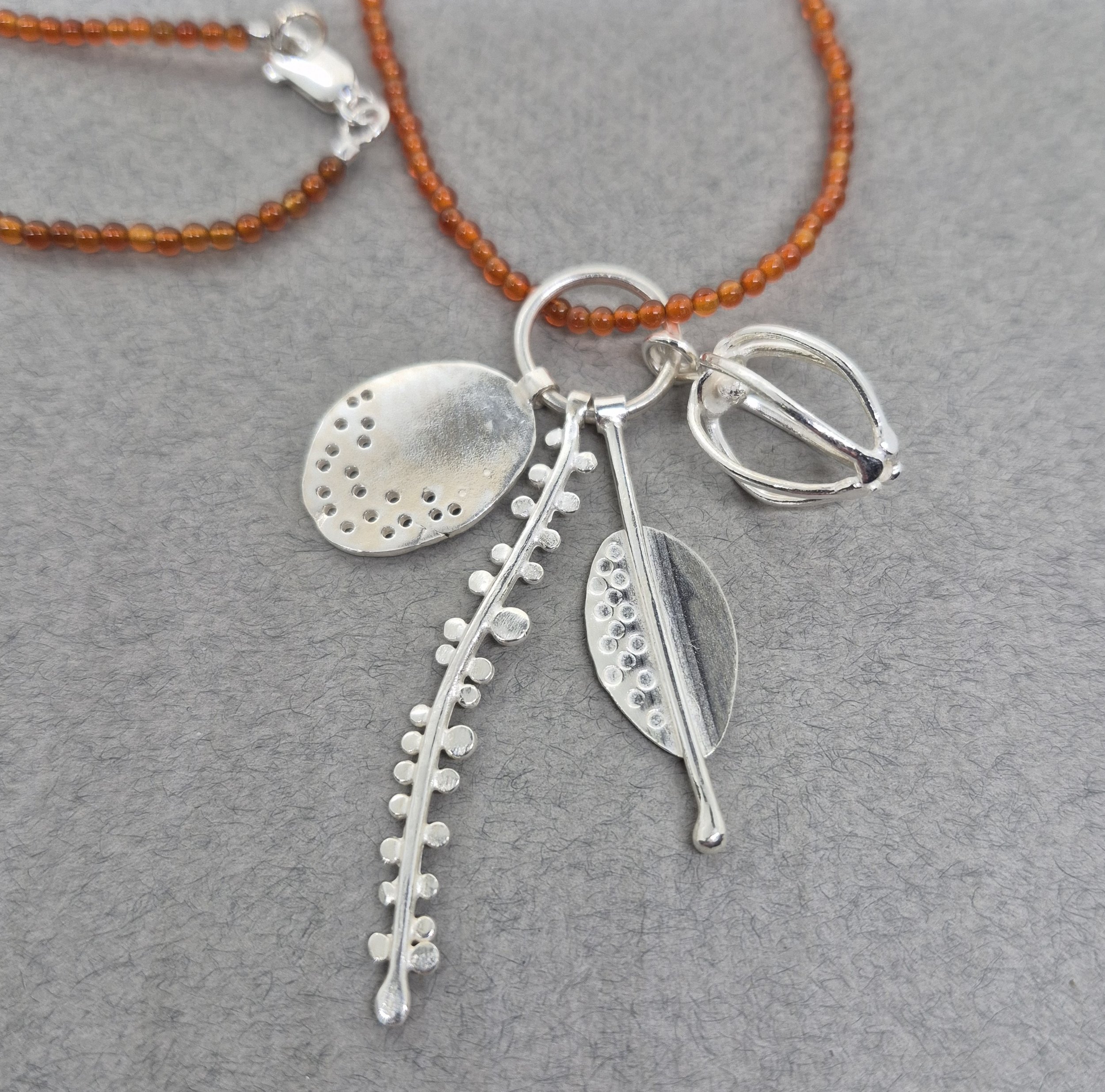 Silver seed pod & carnelian necklace