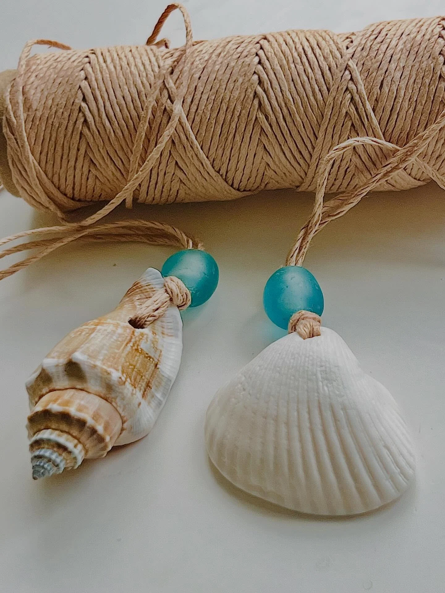 A customer&rsquo;s vision&hellip; guided by the tide 🌊

🌴 Florida-found shells, recycled glass, braided hemp-woven together with purpose and a little wild spirit 

🤍 This is why I love custom work 

🌊 Each element carrying a story of the sea earr
