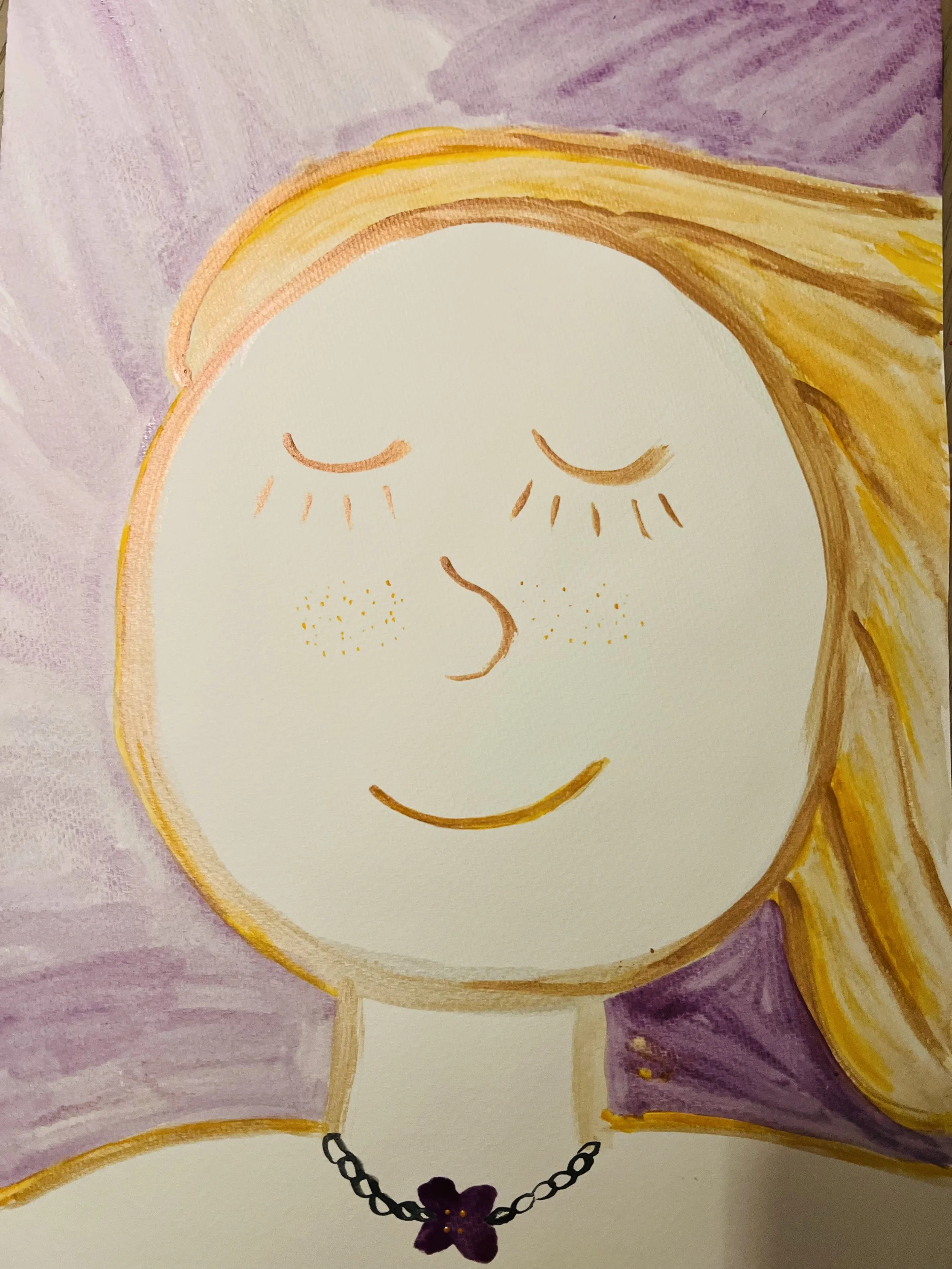 Smiling girl with freckles and golden hair