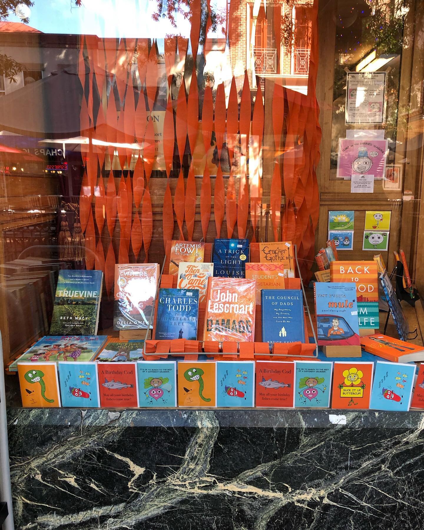 Come out and paint the town Orange! Window display courtesy of Anjeli Shankar, and unique cards at lower edge of window courtesy of All-Powerful Creative Queen Marsha Spain Fuller!