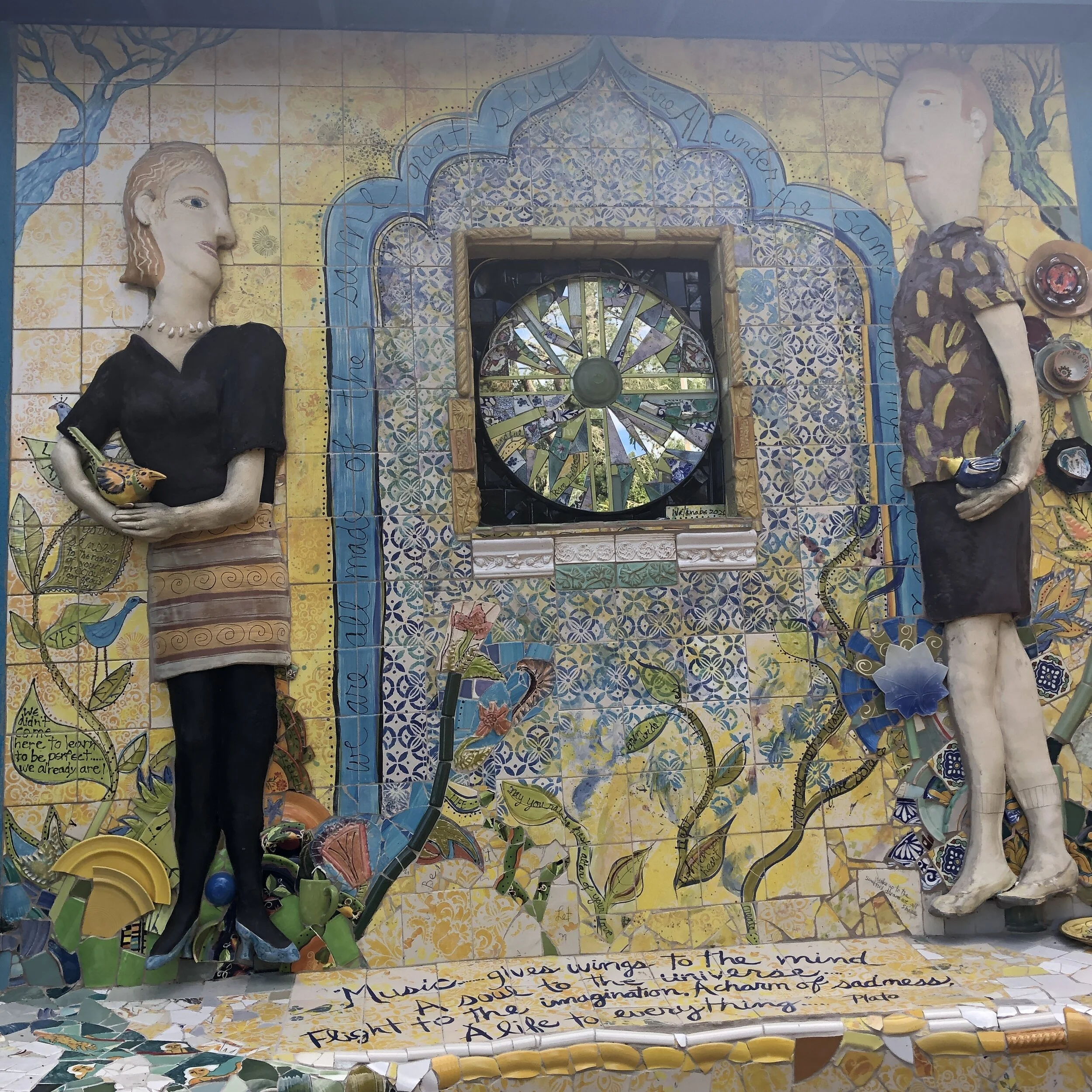 Suki Diamond Figures and Mosaic Wall
