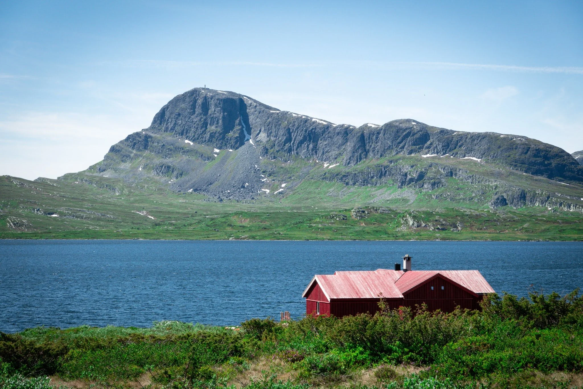 Red house on a lake in Norway