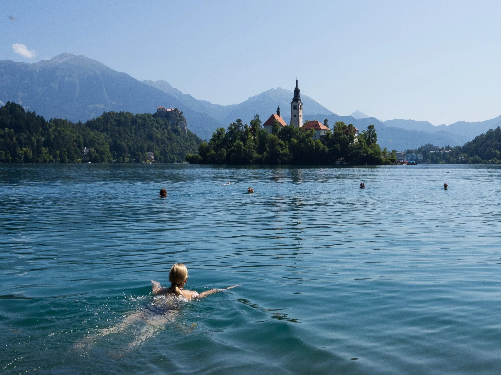 Woman swimming in Lake Bled