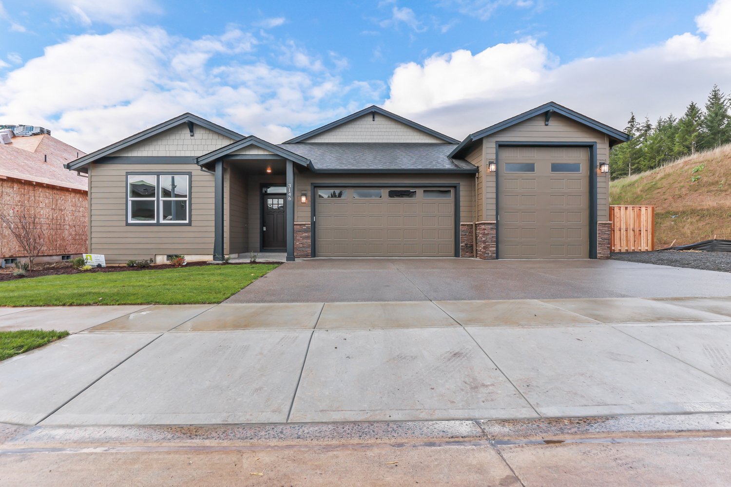 Front of House, Paint Oak Leaf Brown SW 7054, Trim Inkwell SW 6992, Accent Felted Wool SW 9171, Stone Wolf Creek Southern Ledgerstone (4).jpg