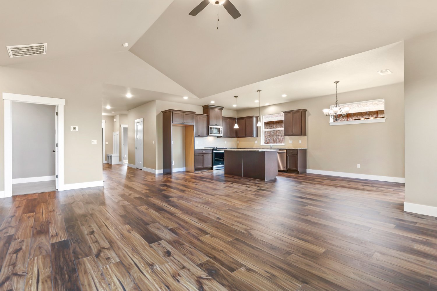 Flooring Calypso Whiskey, Cabinets Mantra Hardwood Bark, Paint Sherwin Williams Benjamin Moore Blanched Almond # 1060.jpg