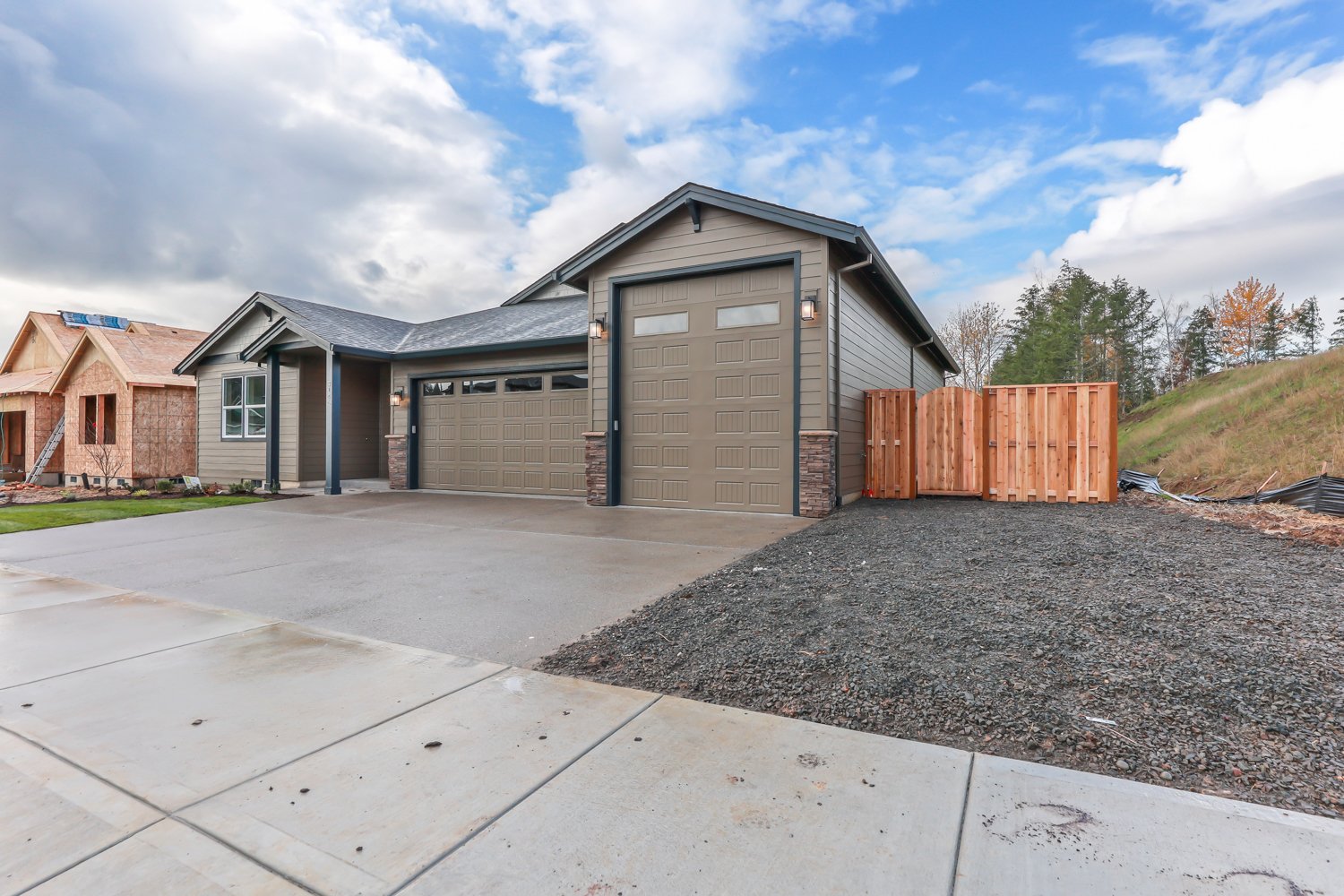 Front of House, Paint Oak Leaf Brown SW 7054, Trim Inkwell SW 6992, Accent Felted Wool SW 9171, Stone Wolf Creek Southern Ledgerstone (2).jpg