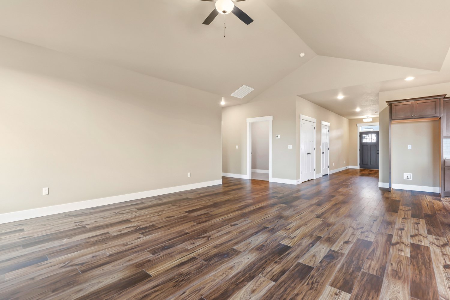 Flooring Calypso Whiskey, Paint Sherwin Williams Benjamin Moore Blanched Almond #1060, White trim.jpg