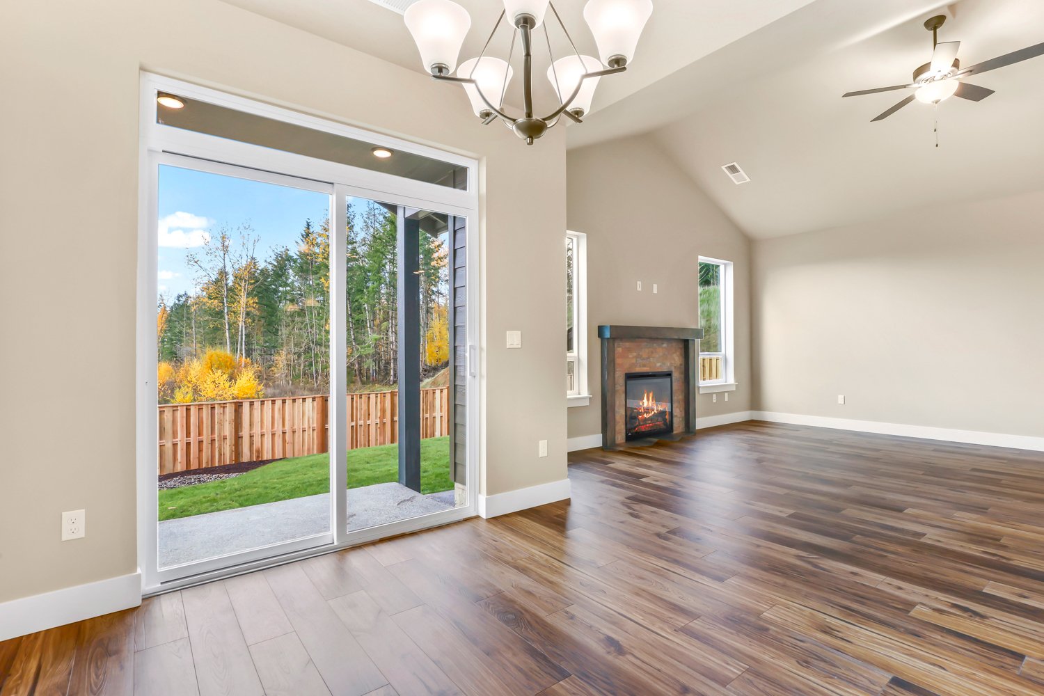 Back door, Flooring Calypso Whiskey, Fireplace Brique Cotto, Stained beam with legs, Paint Sherwin Williams Benjamin Moore Blanched Almond #1060, White trim.jpg