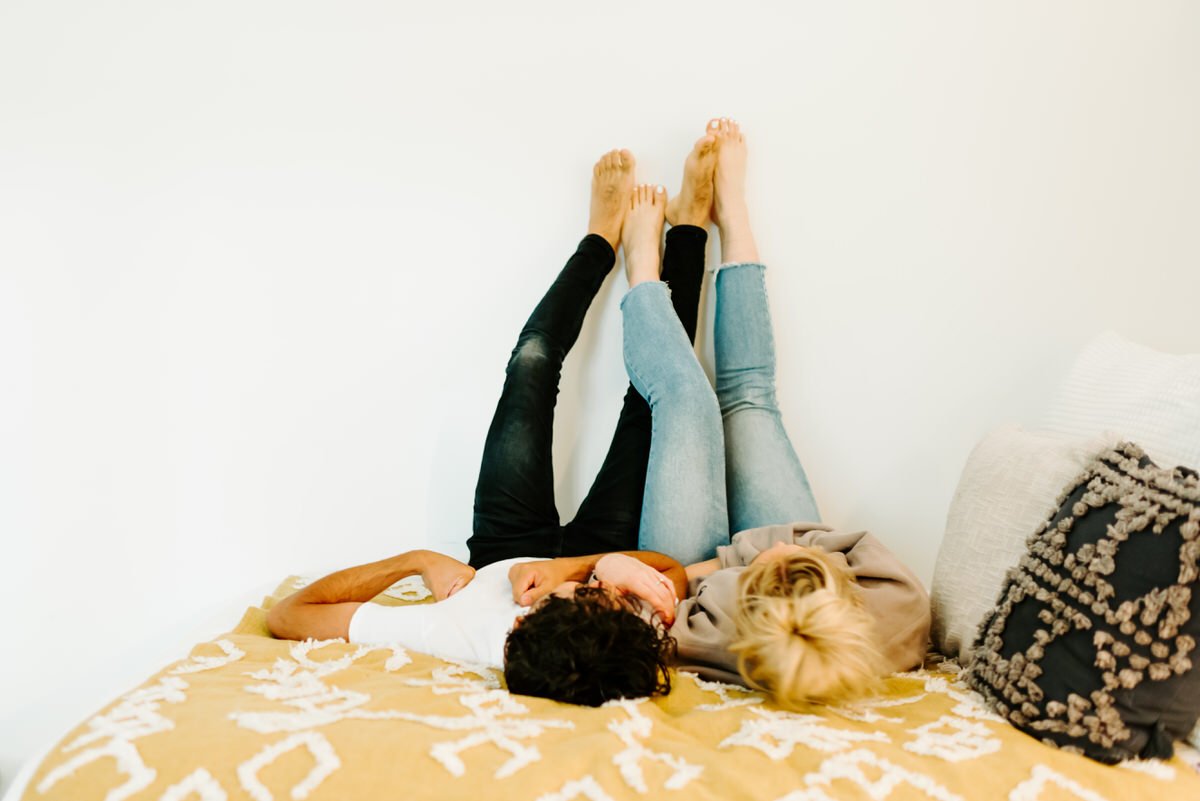 Couple Laying in Bed At-Home Couples Shoot Stephanie Cintron Photographer