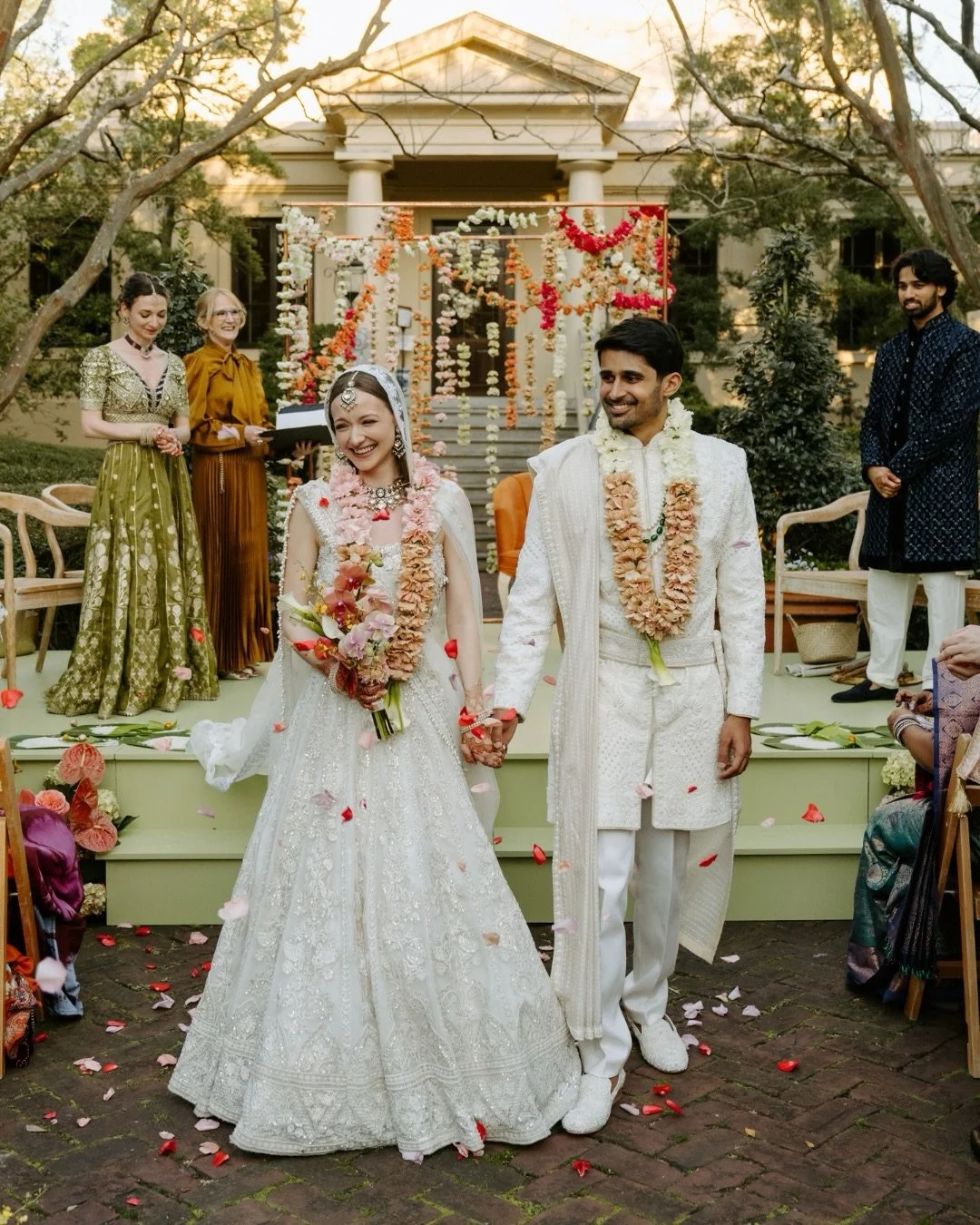 A wedding weekend in Savannah that will never be forgotten &mdash; two families coming together to celebrate Alston and Nayan in an Indian wedding inspired by culture, beauty, and harmony. Bright, rich tones of peach, pink, orange, and gold took the 