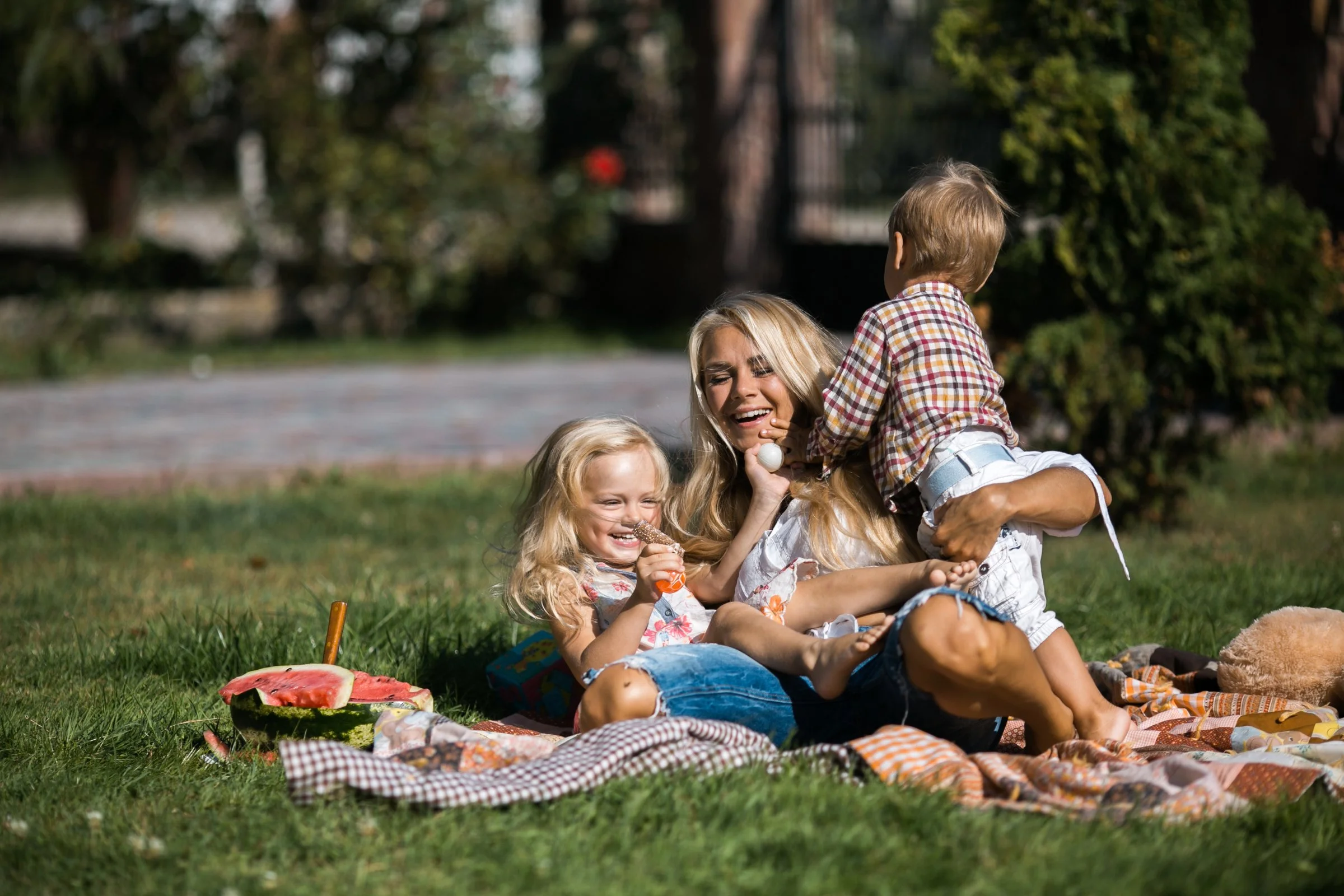 Experienced nanny engaging children in structured play while parent works from home