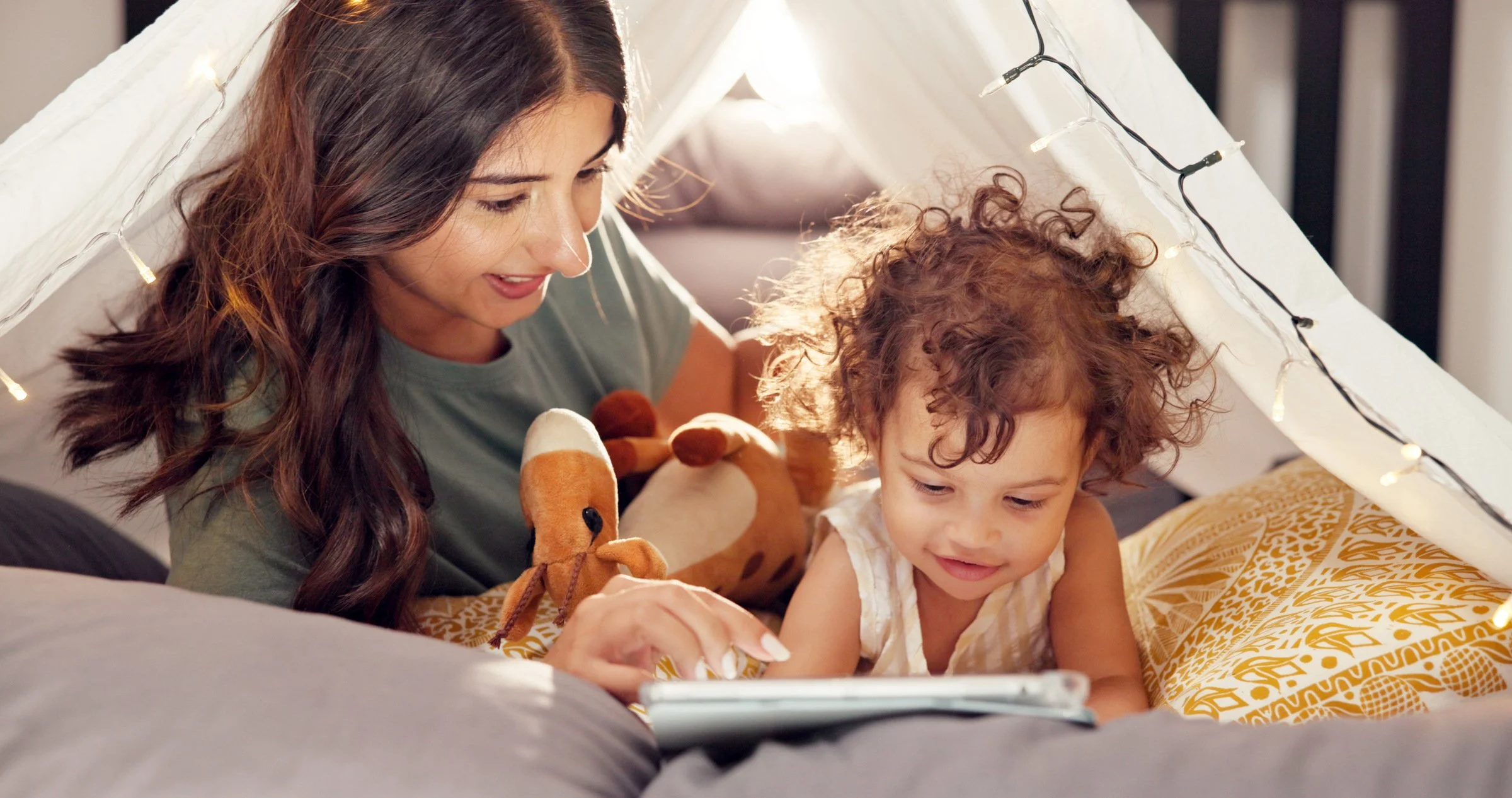 nanny supporting child development through reading and play