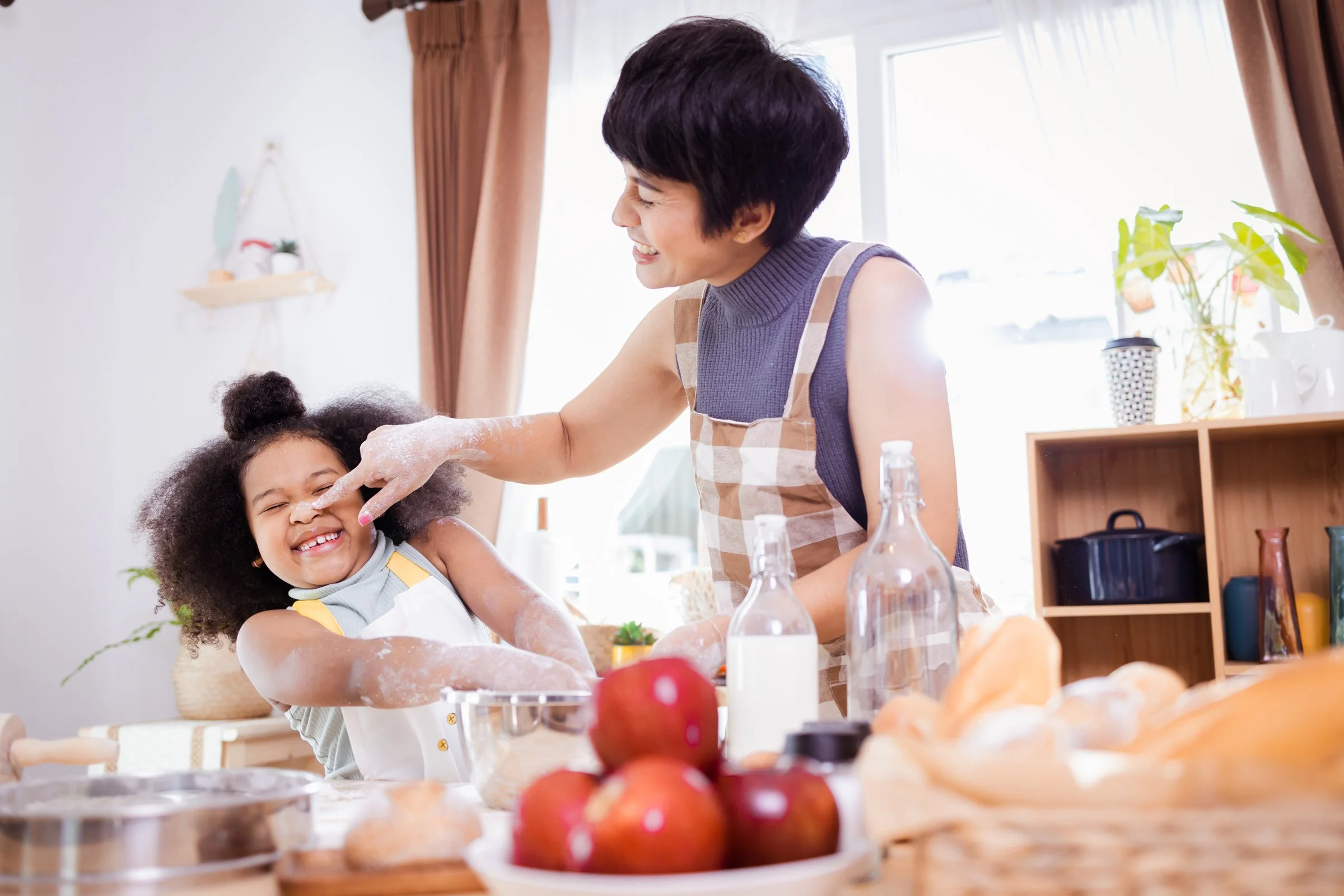 professional nanny preparing breakfast before parents leave for hospital