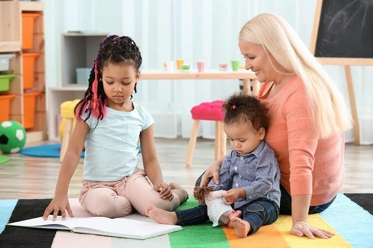 Nanny helping establish a consistent daily routine with a child