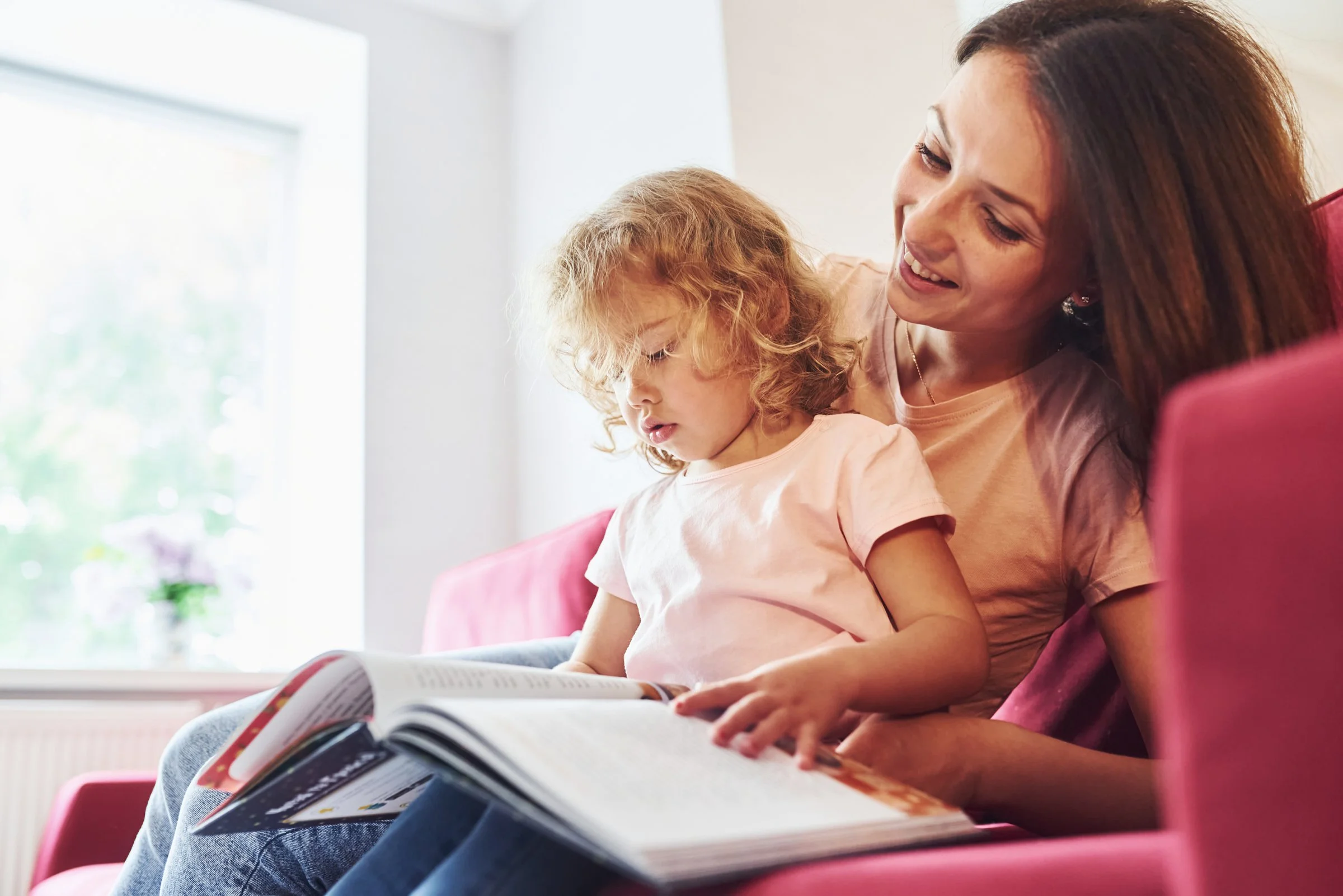 Single parent enjoying quality family time after completing flexible remote work.