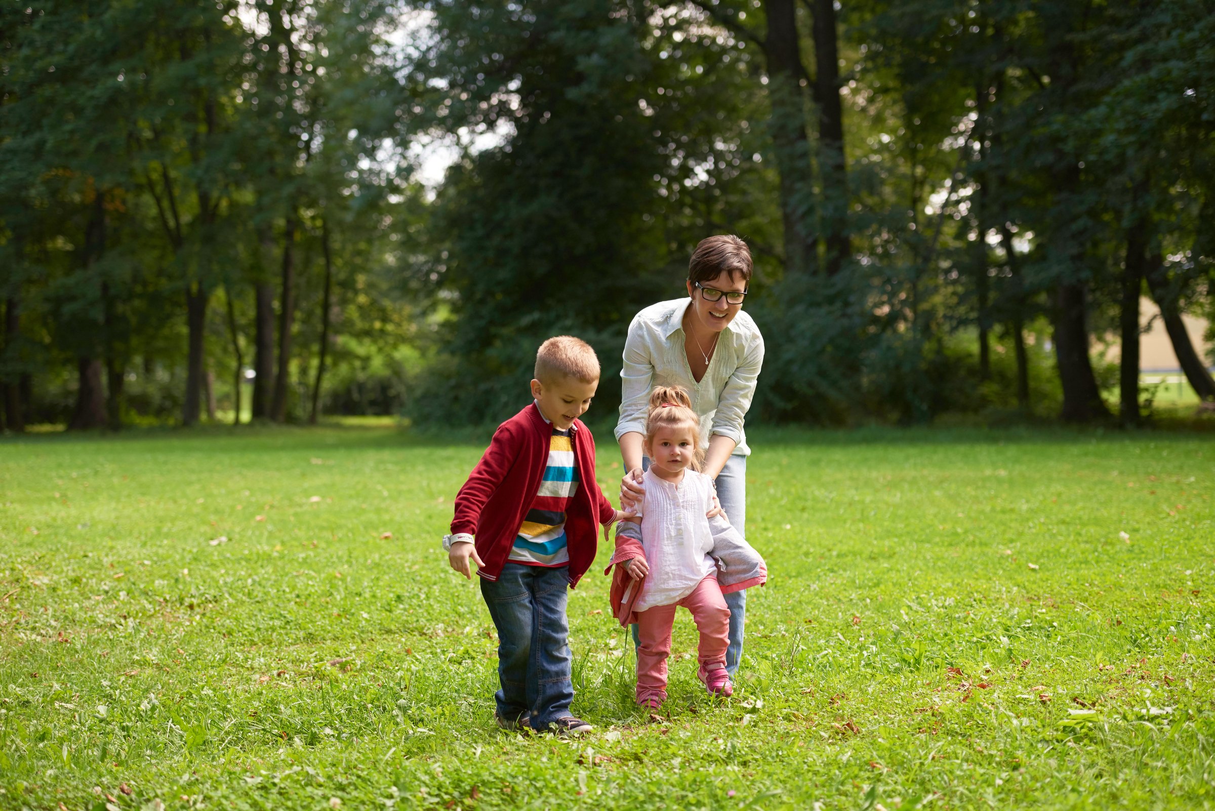 professional nanny walking children in Cincinnati neighborhood