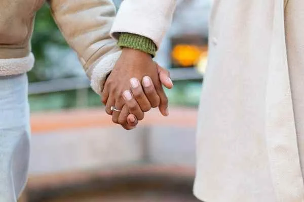 couple holding hands