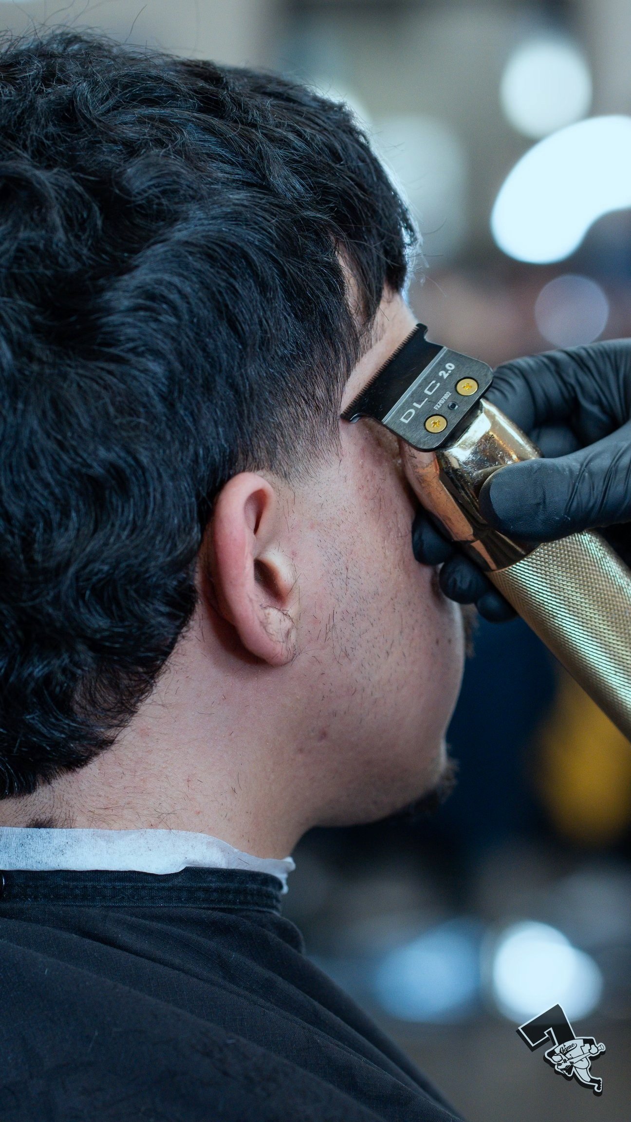 mullet haircut at vintage-inspired barbershop in Denver