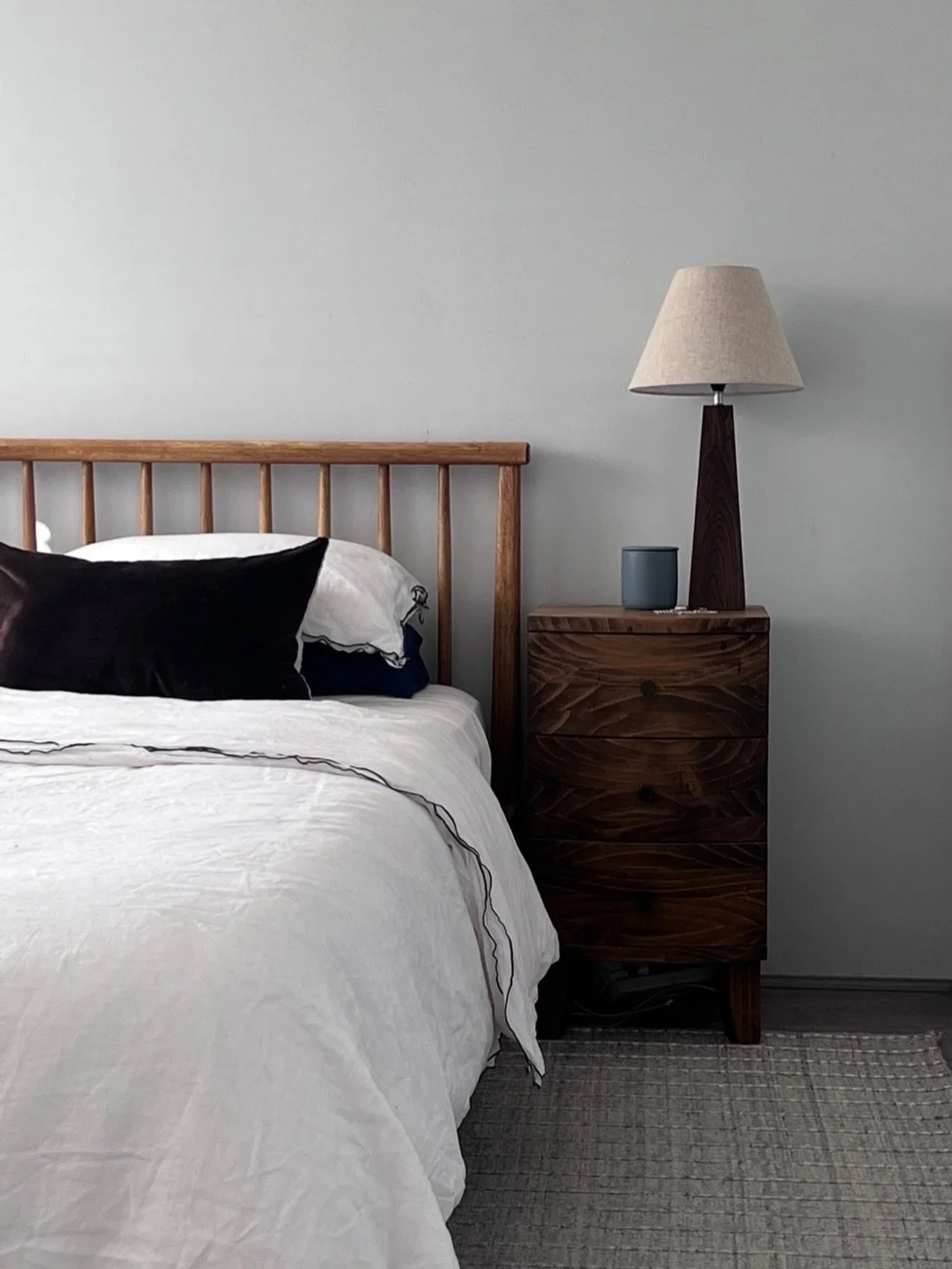 A bedroom refresh with a simple brief: keep the room feeling clean, calm and practical, while bringing more warmth through the furniture, lighting and textiles.

The rug was chosen at a scale that properly grounds the bed, extending beyond the sides 
