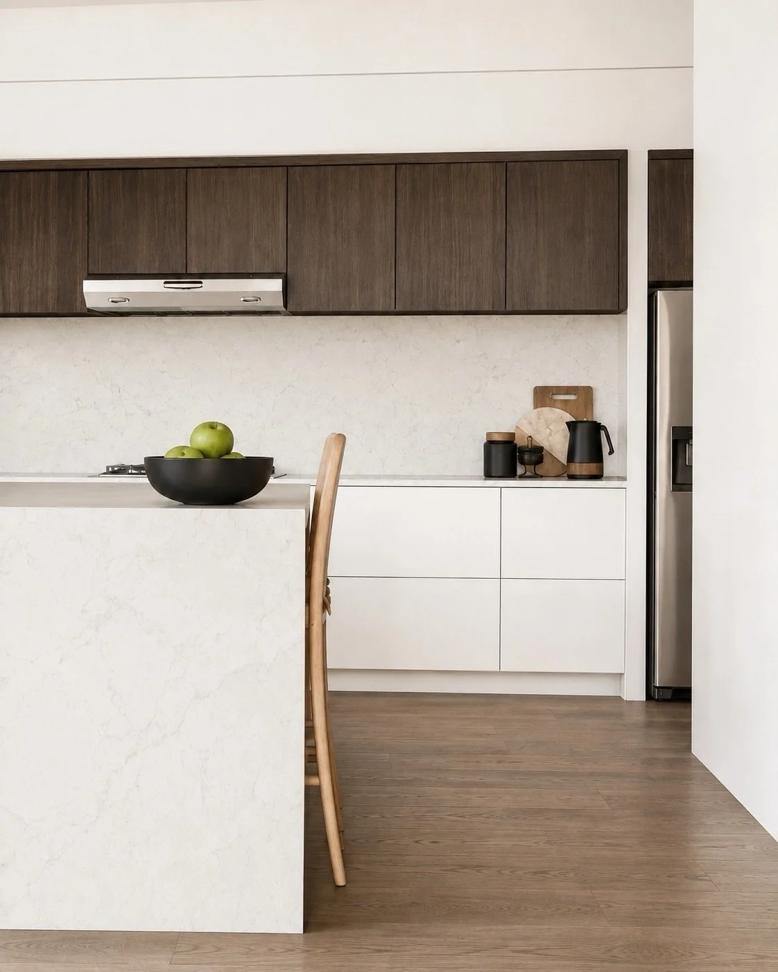Same kitchen design layout but with two different finish direction. 

The joinery, proportions and overall layout are doing the same, but the feel and the mood of the space shifts quite a bit once the material direction changes.

This is why it helps