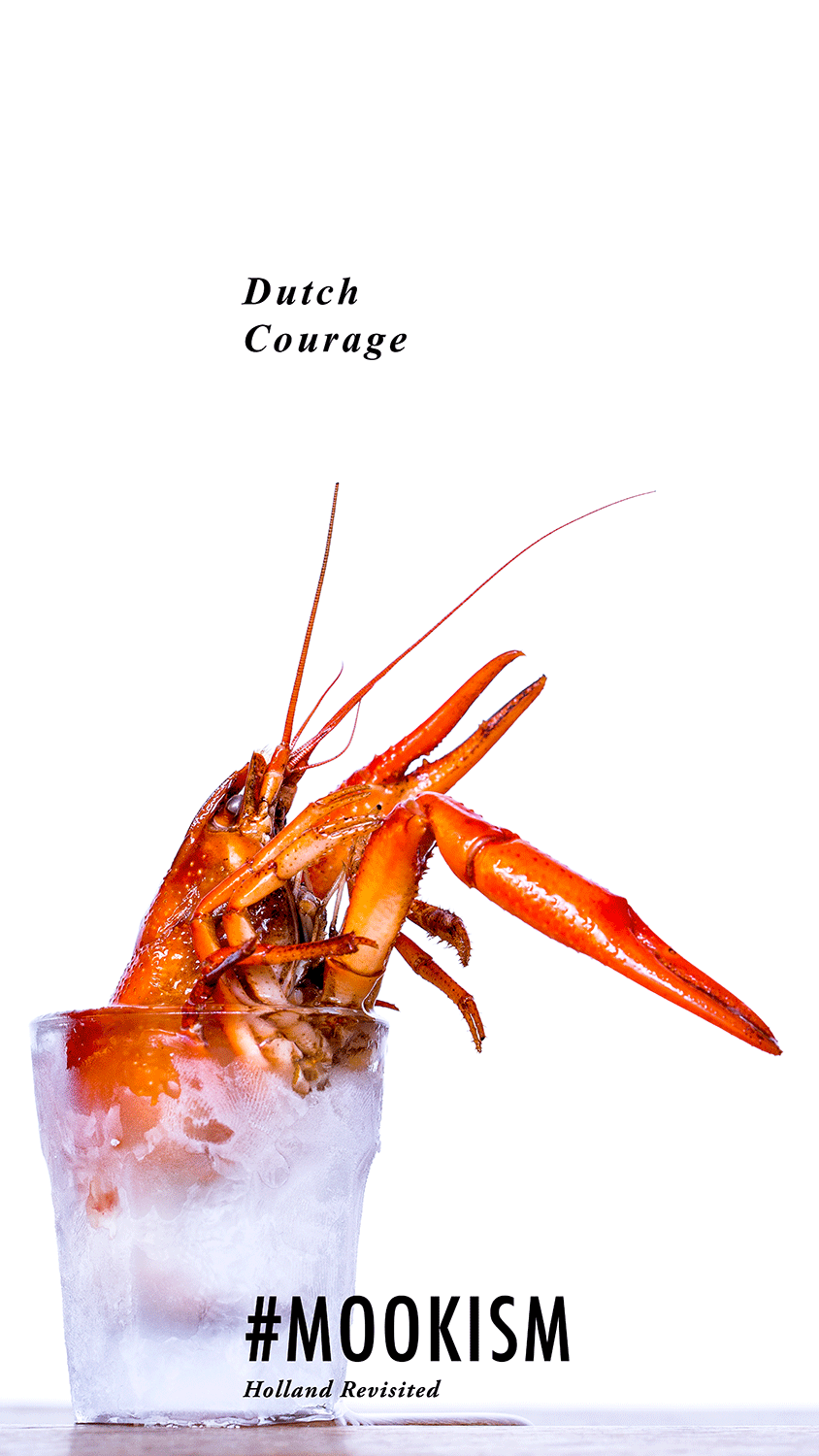 A lobster with claws and antennae submerged in a glass of ice water. #MOOKISM #Beyondcancelation