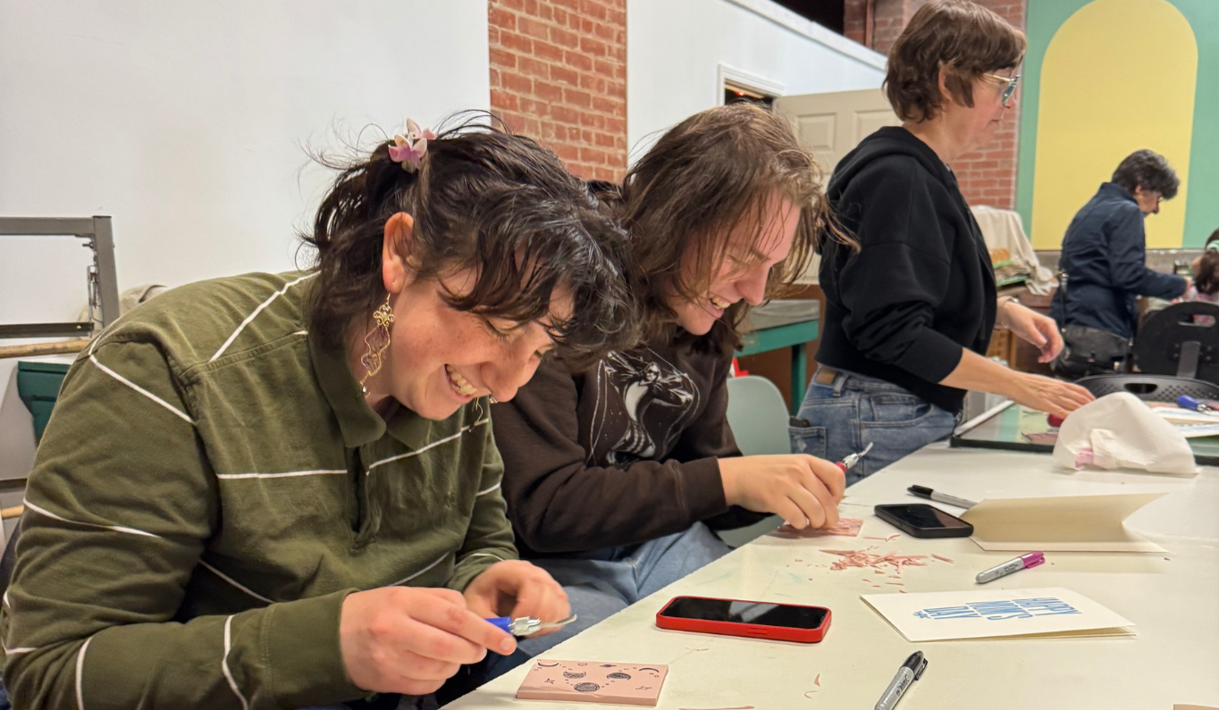 Community members create linocut prints at Zygote Press