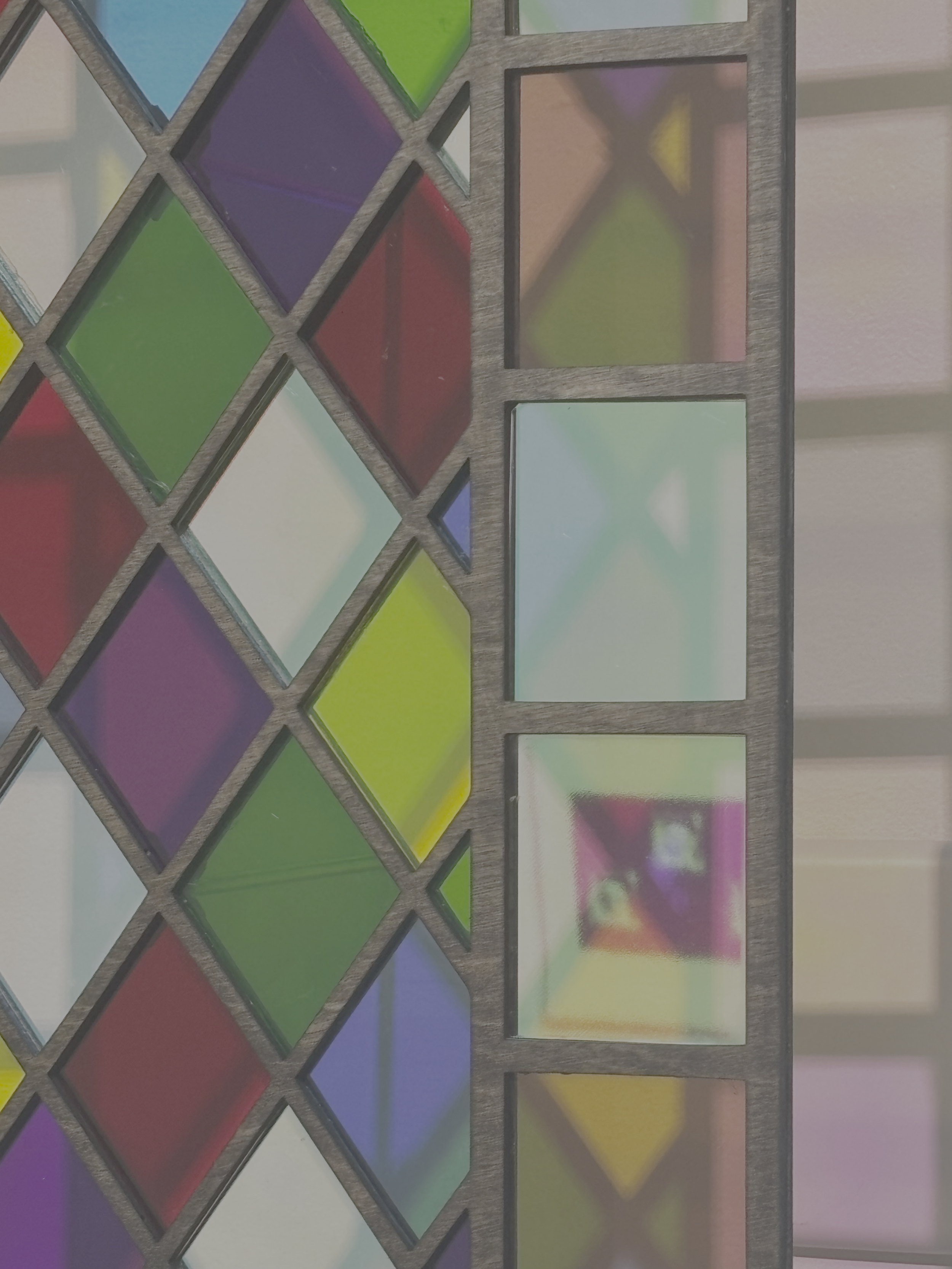 Stained glass window part of installation by Tatyana Atkinson called Who Did the Body?