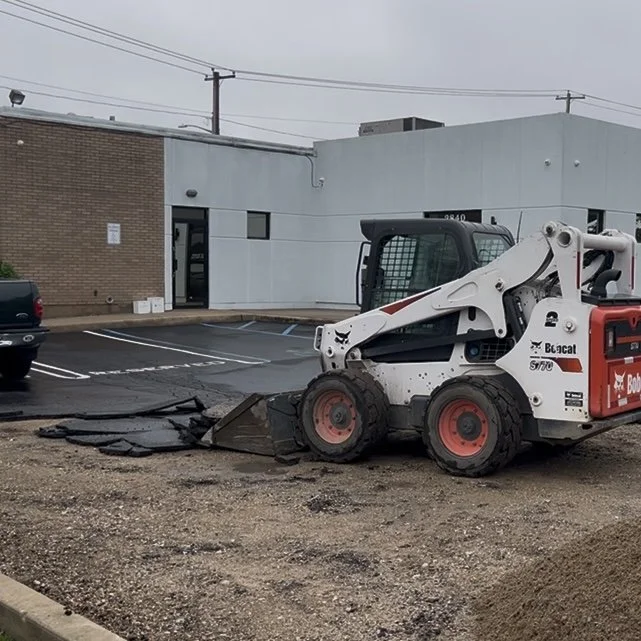 Ripping out an asphalt parking lot on Long Island NY
