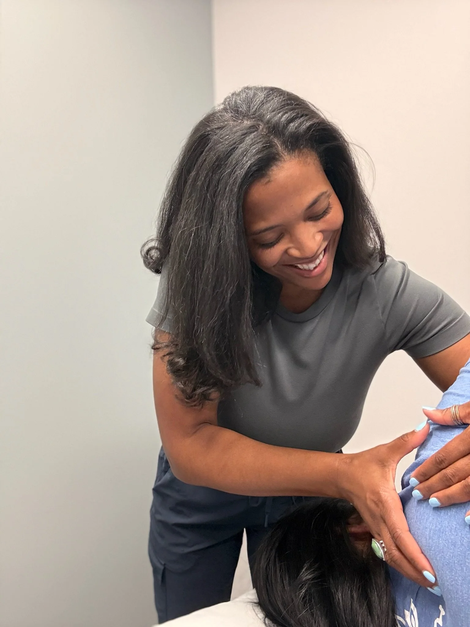 Patient receiving manual therapy on their shoulder from a physical therapist at a performance physical therapy clinic in Arlington, VA
