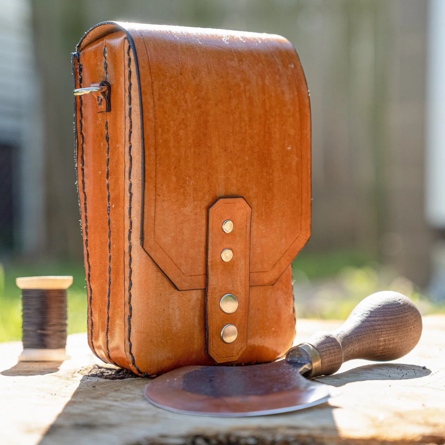 &quot;DS Portable Pouch&quot; - Cowhide Vegetable Tanned Pouch

I was unsatisfied with any portable gaming cases on the market... so I made my own! I went to my workbench and patterned, cut, dyed, coated, polished, and handstitched together this adve