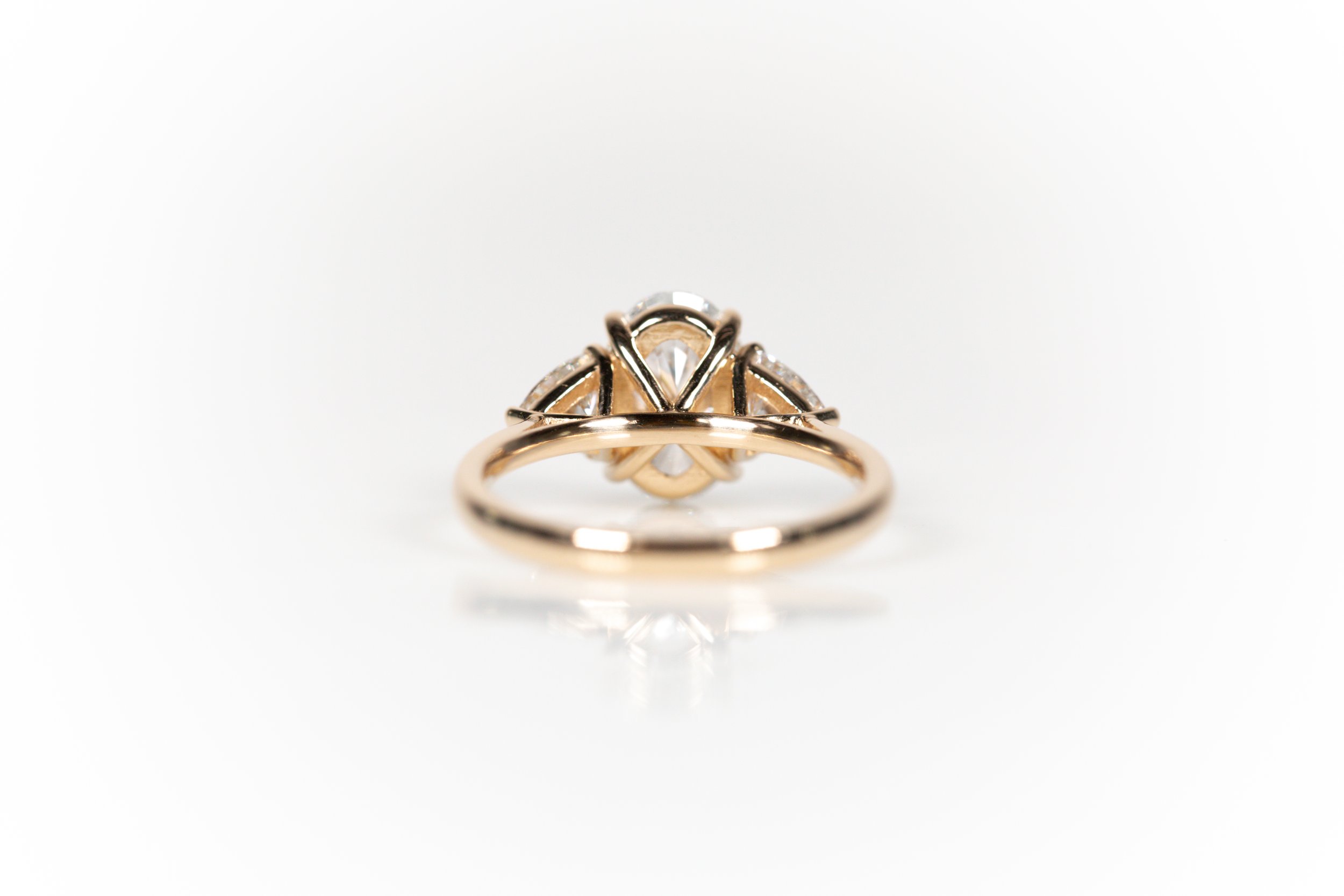 Oval and Trillion Diamond Three Stone Engagement Ring