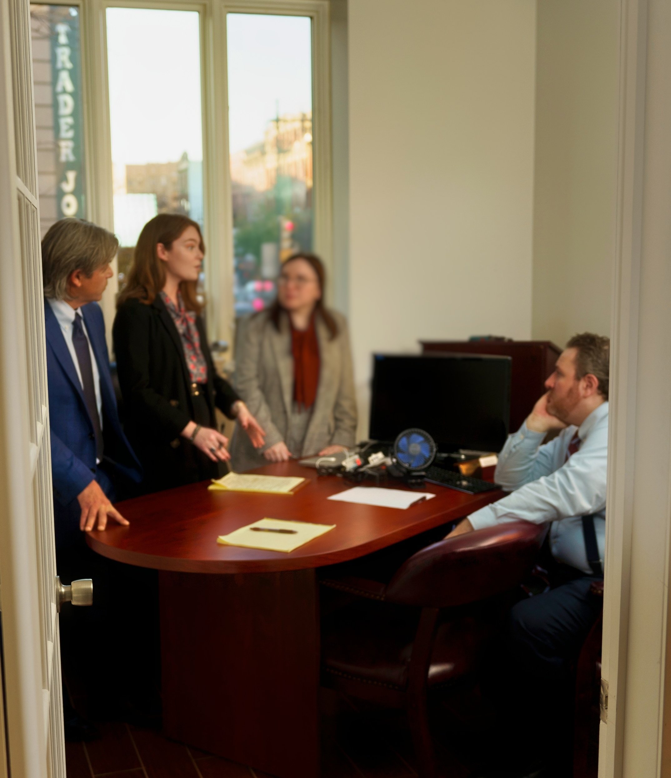 Jonathan Rosenberg with staff in office