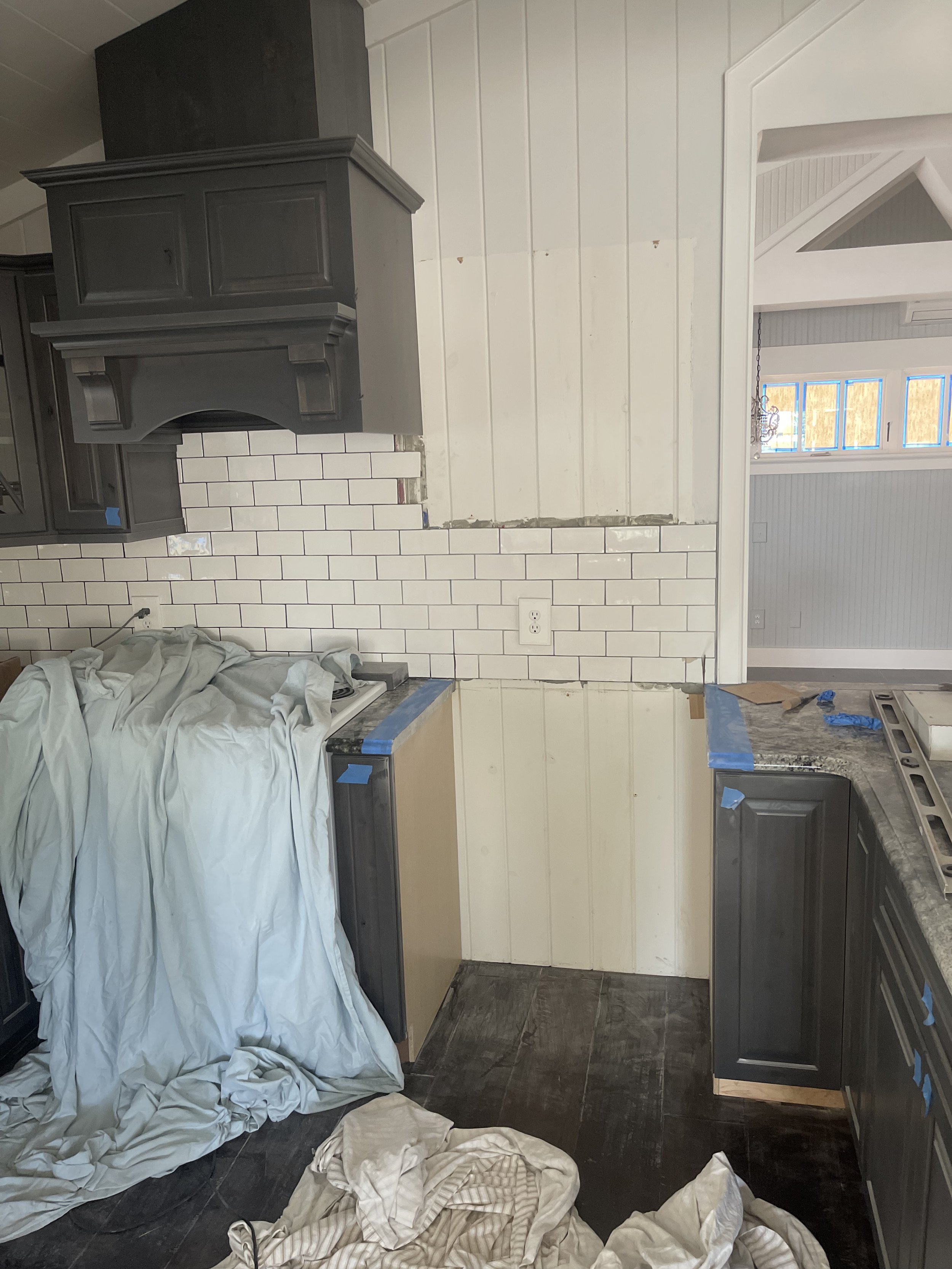 Kitchen after cabs removed, counter cut