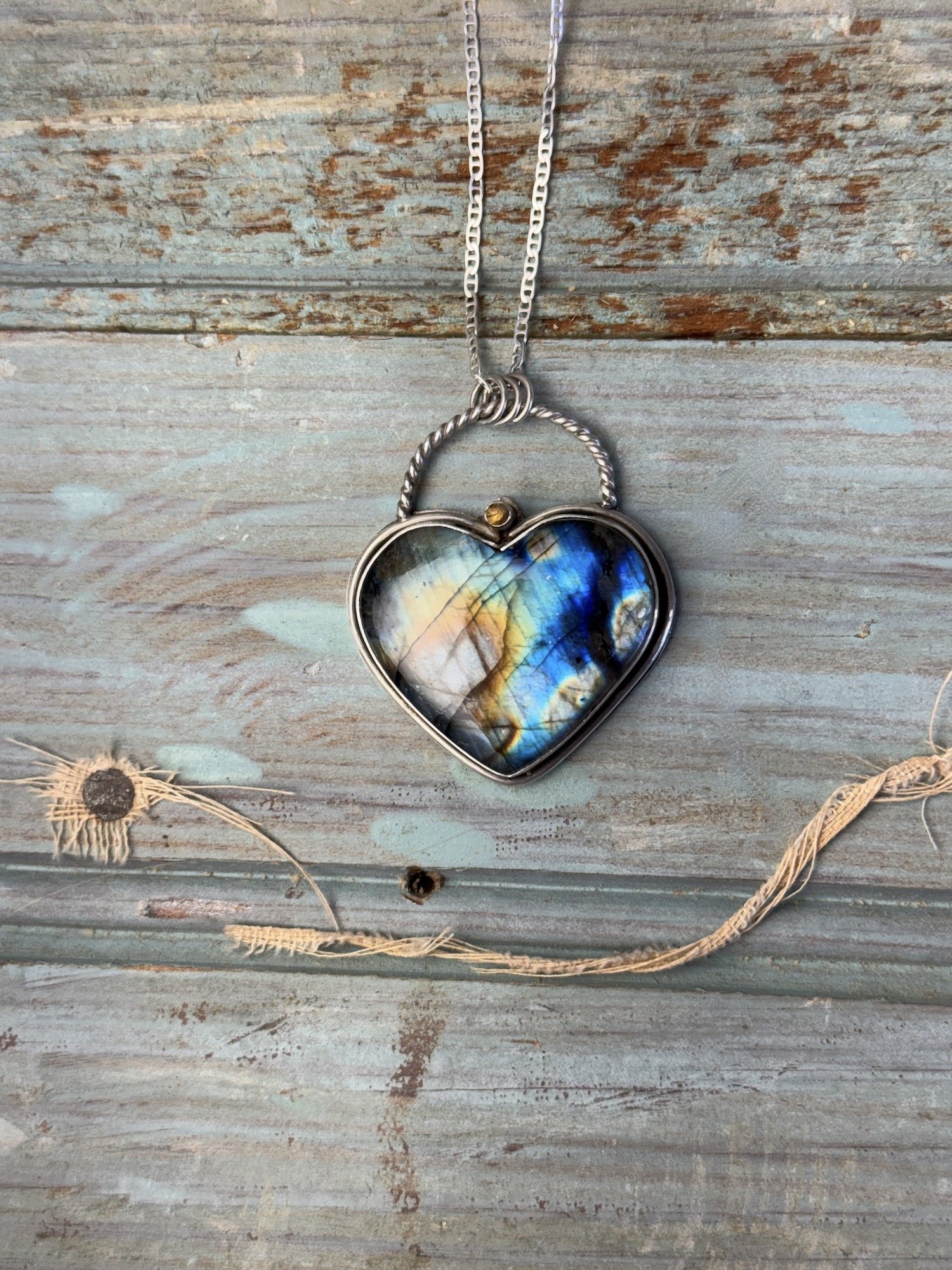 Large Labradorite heart with Tourmaline.jpeg