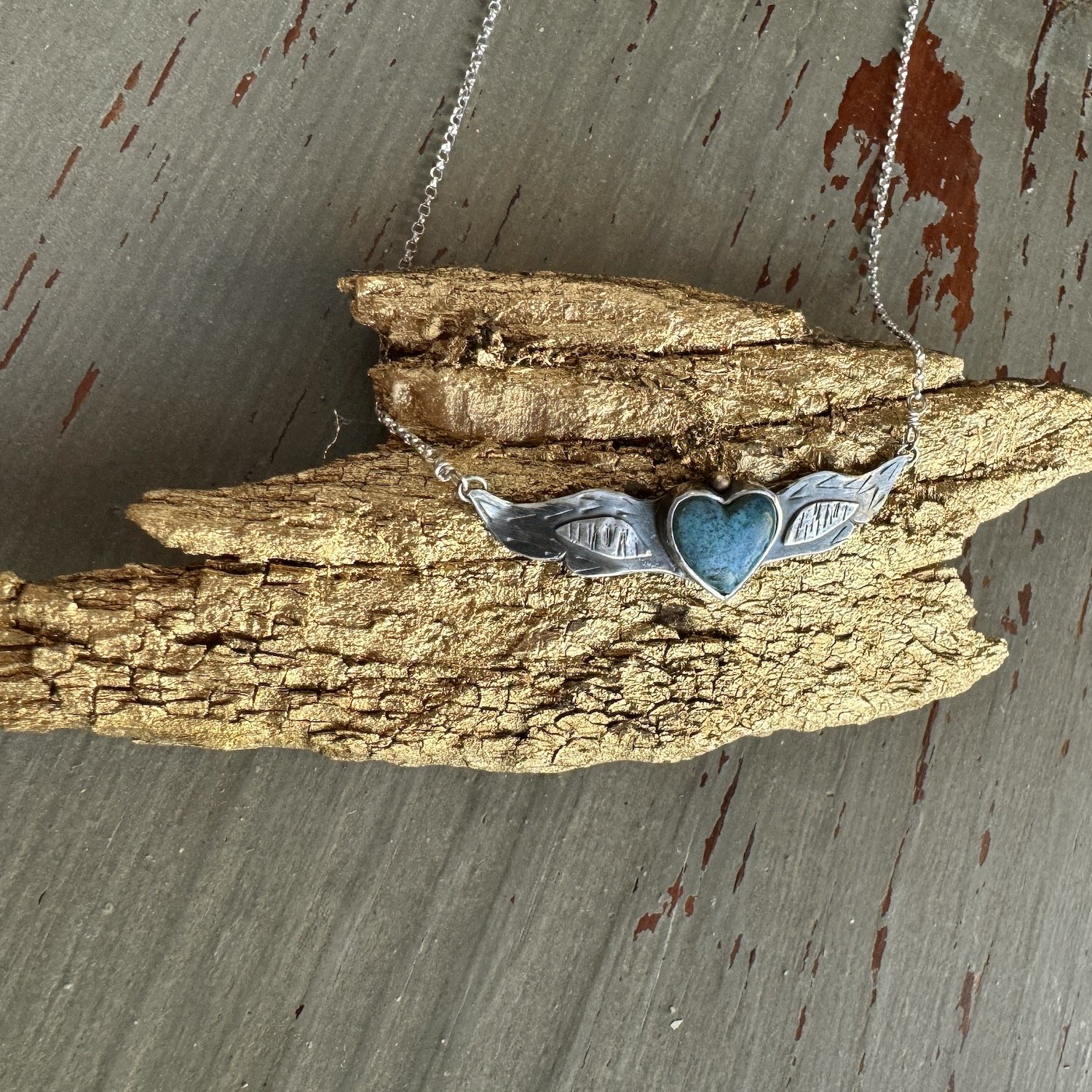 Small Turquoise Winged Heart with Gold.jpeg