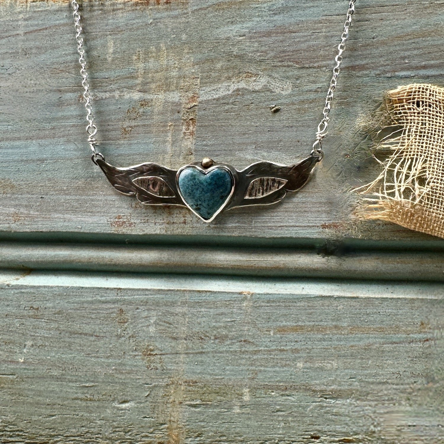 Small Turquoise Winged Heart with Gold 5.jpeg
