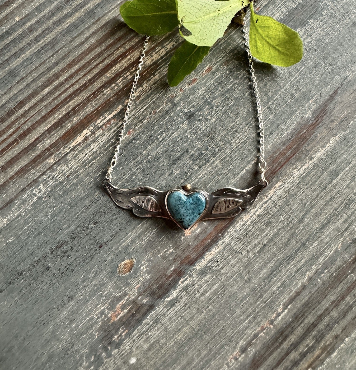 Small Turquoise Winged Heart with Gold 3.jpeg