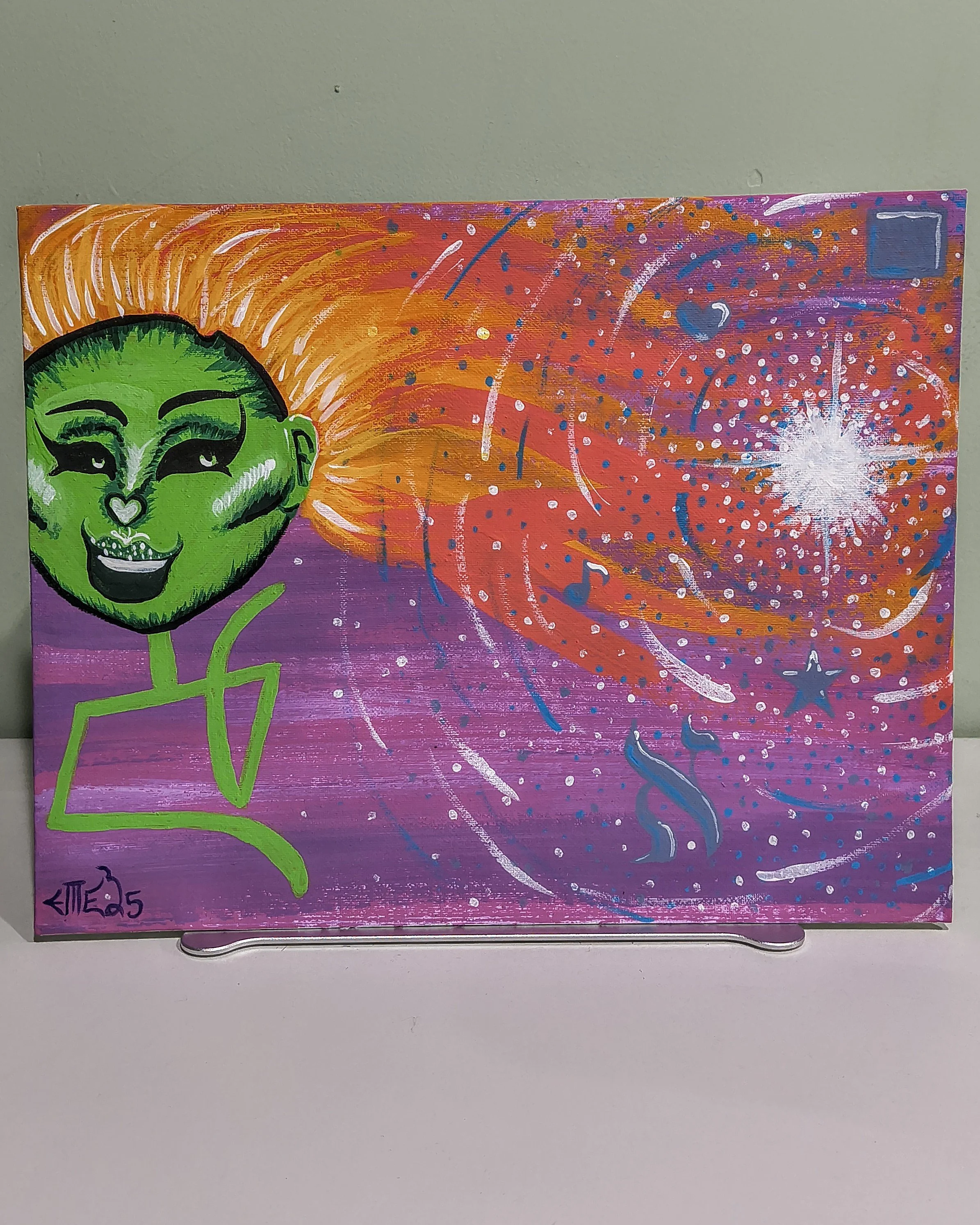 Colorful abstract painting with a green cartoonish face, swirling background, and various shapes like stars, dots, musical notes, and a burst of white light.