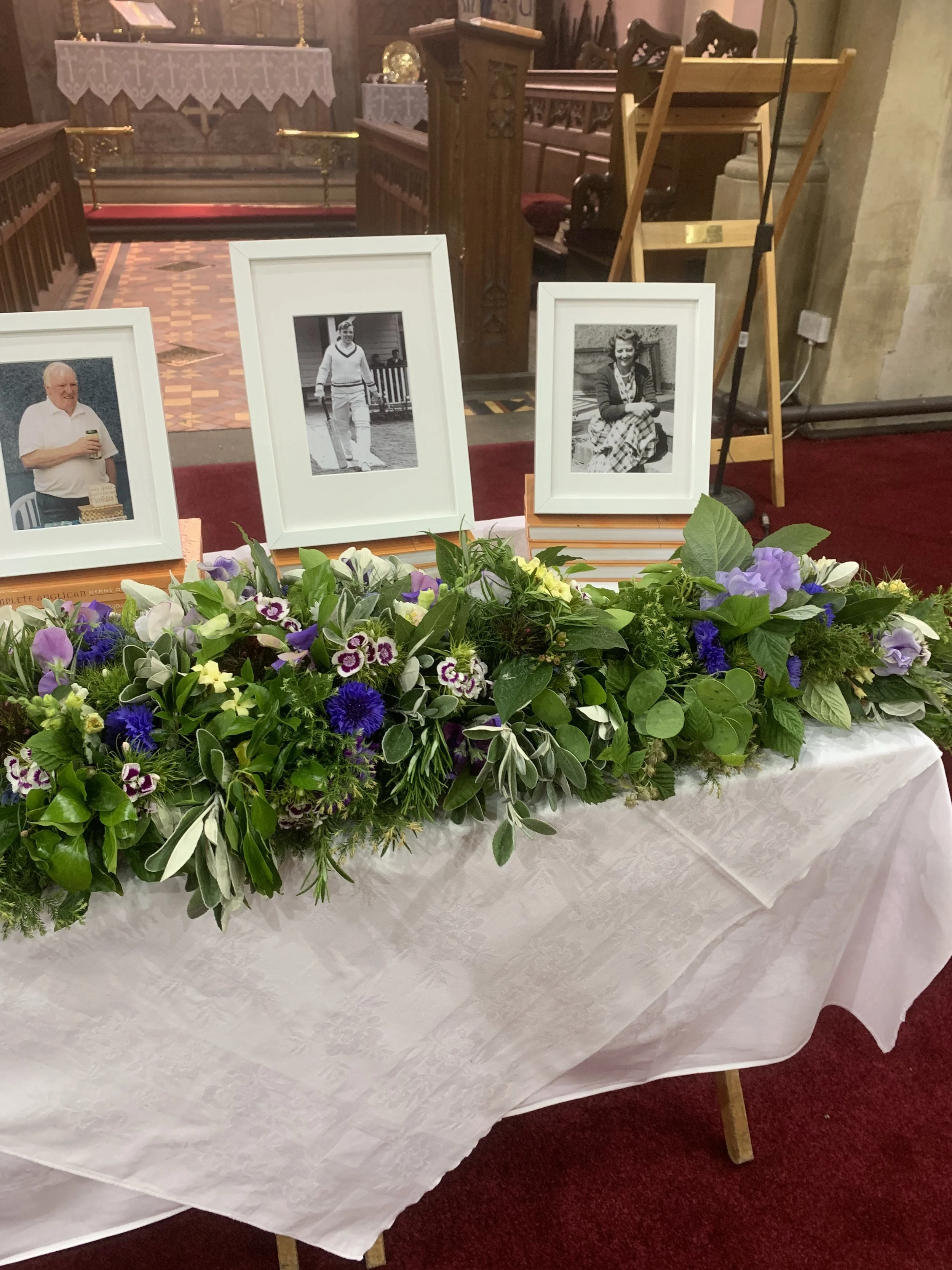 Memorial flower garland with purple sweet peas and cornflower from Blue Hill Flora