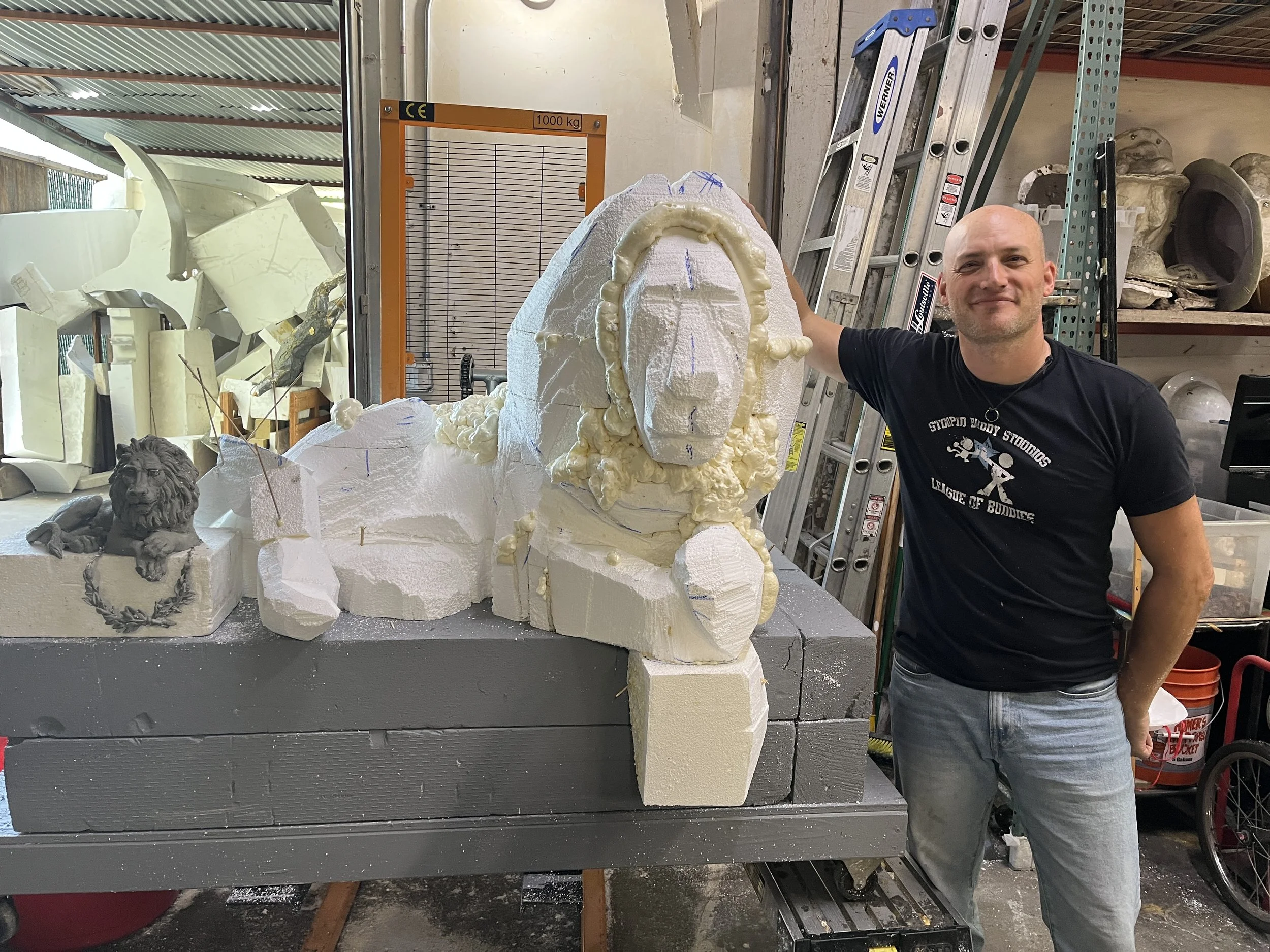 John Sumner sculpting the lion with the maquette featured