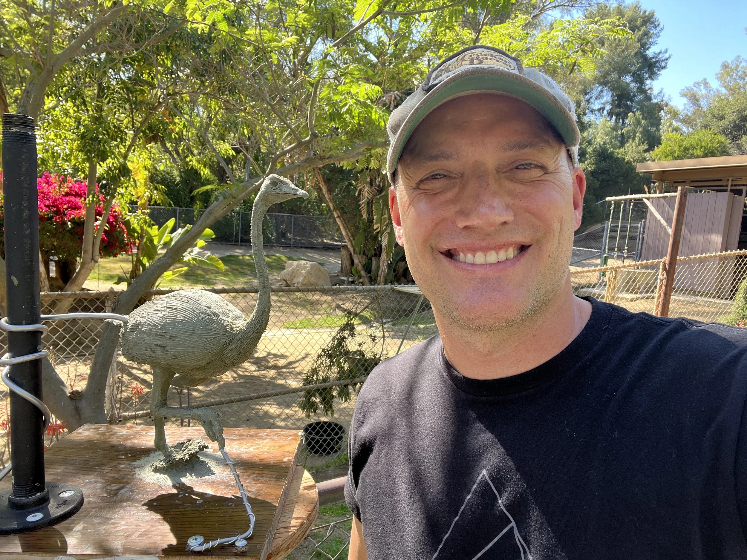 John Sumner plein air sculpting an ostrich at the LA Zoo