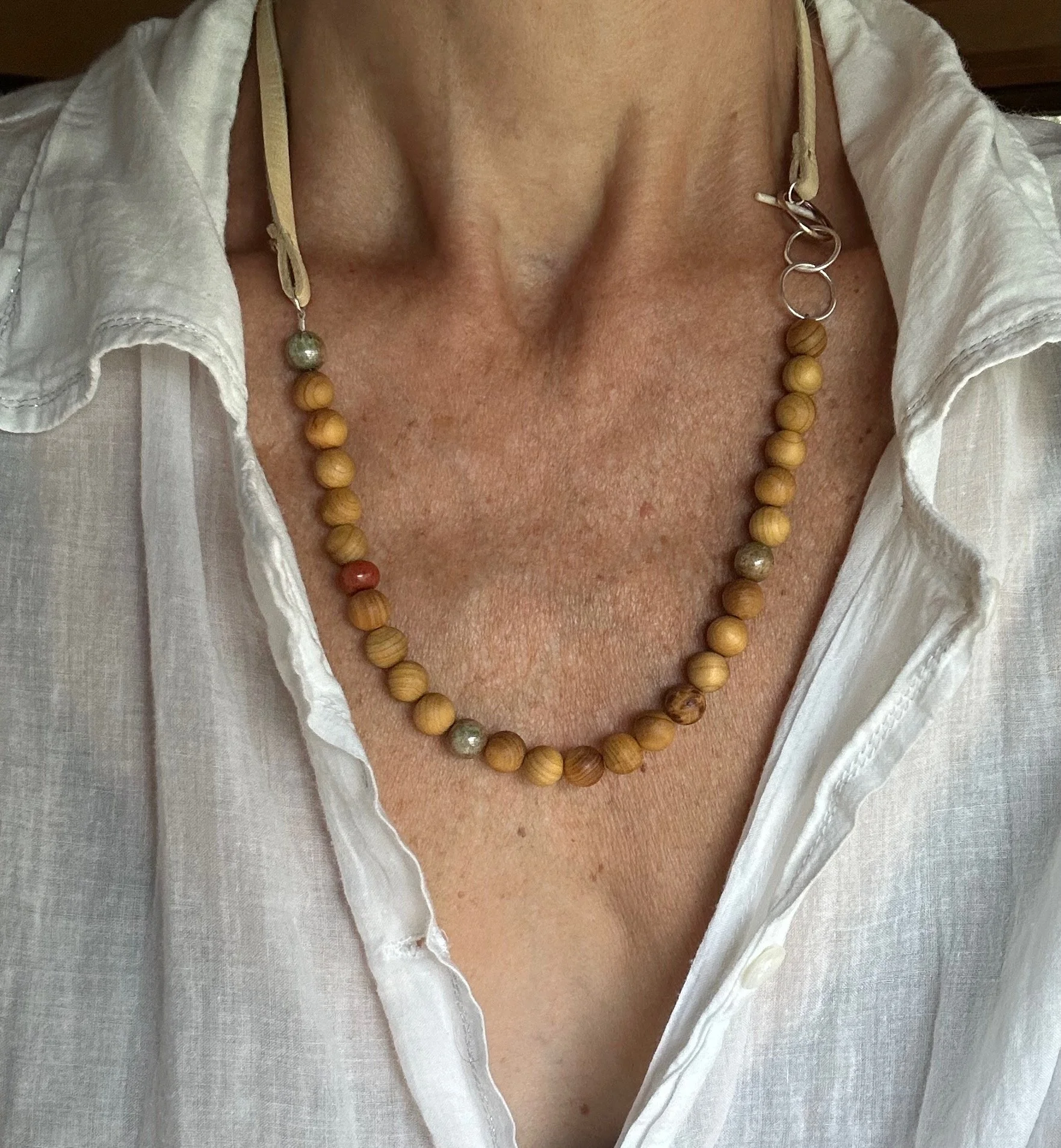 sandalwood, vintage druk beads + leather