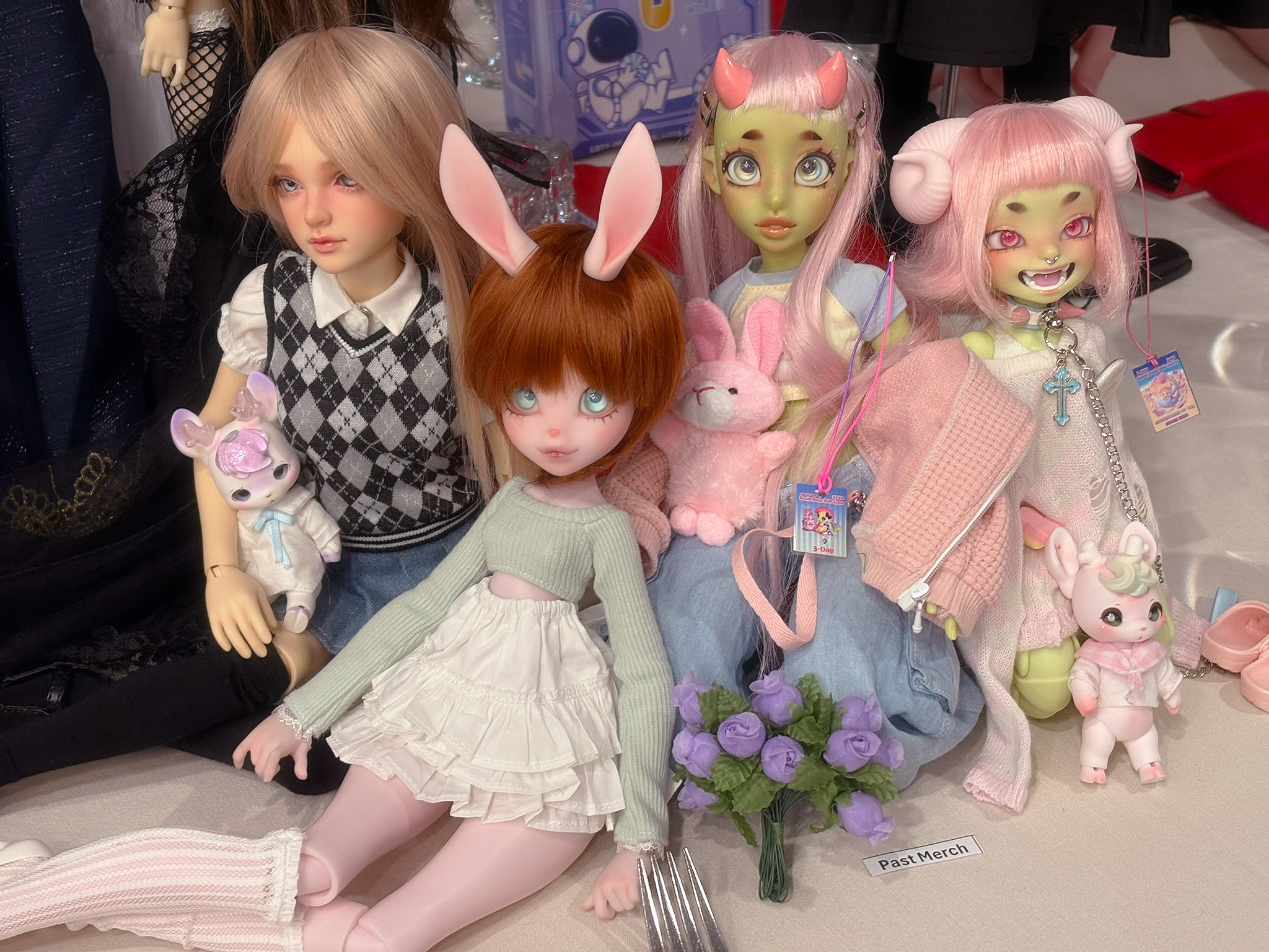 Ball jointed dolls sitting at a table including Rap1993 Danni V2 Rap1993 Anie Rap1993 Biao Cocoriang BJDs