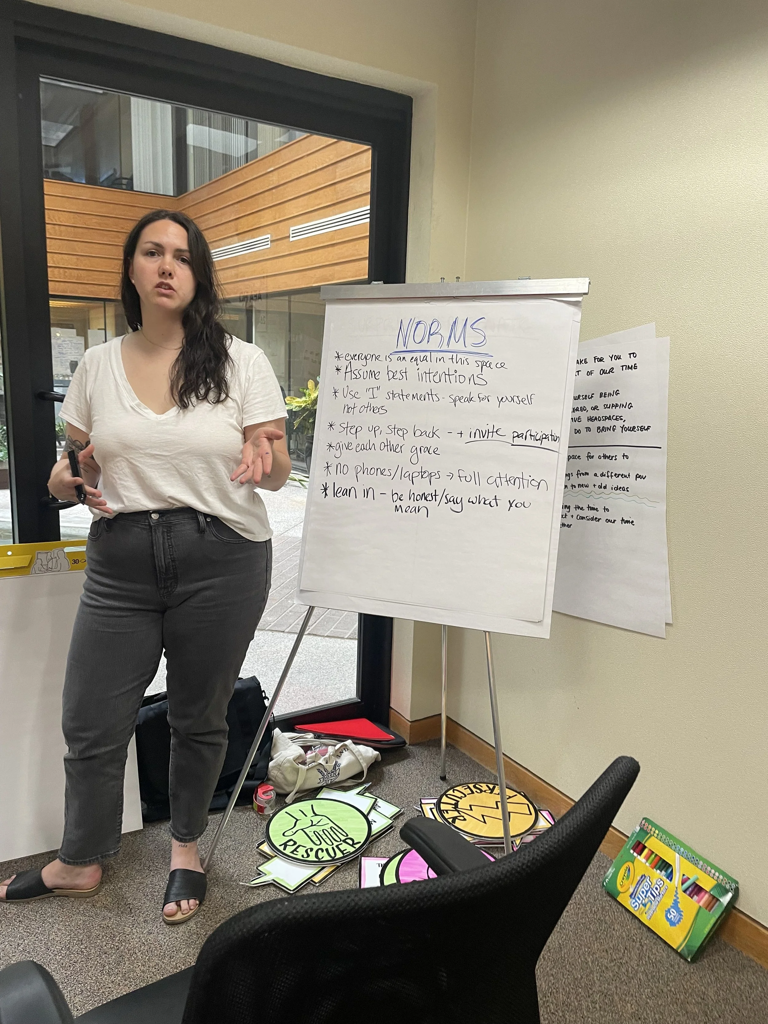 Kinship coach, Jules, facilitates a session at an in-person retreat in Arizona.