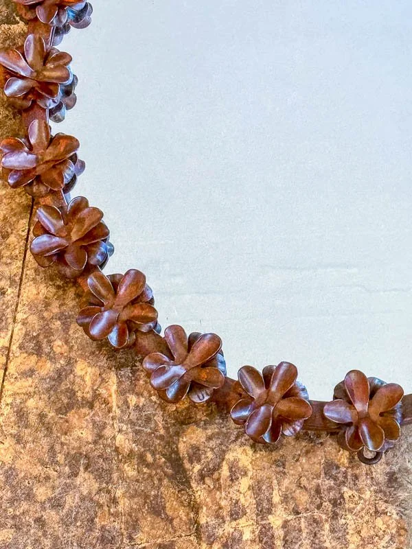 Marigold-interiors-forged-iron-flower mirror-oval-detail.jpg